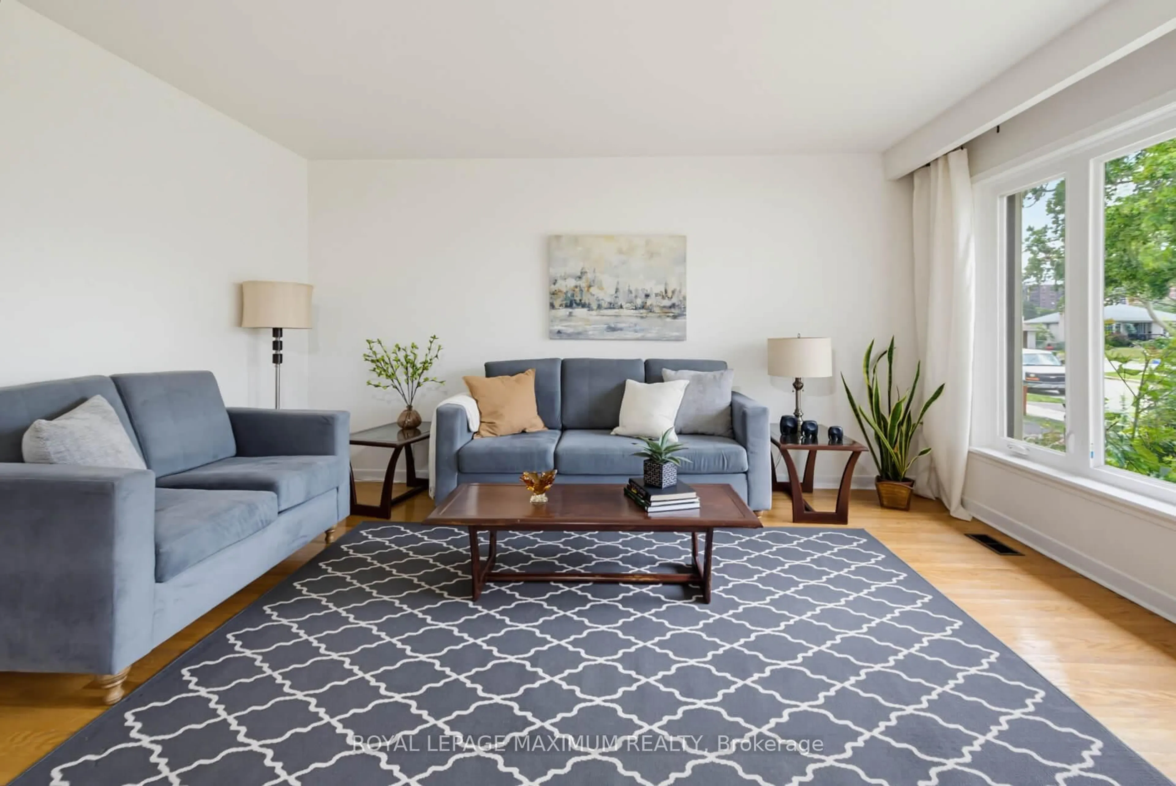 Living room with furniture, carpet floor for 41 Strathavon Dr, Toronto Ontario M9V 2H4