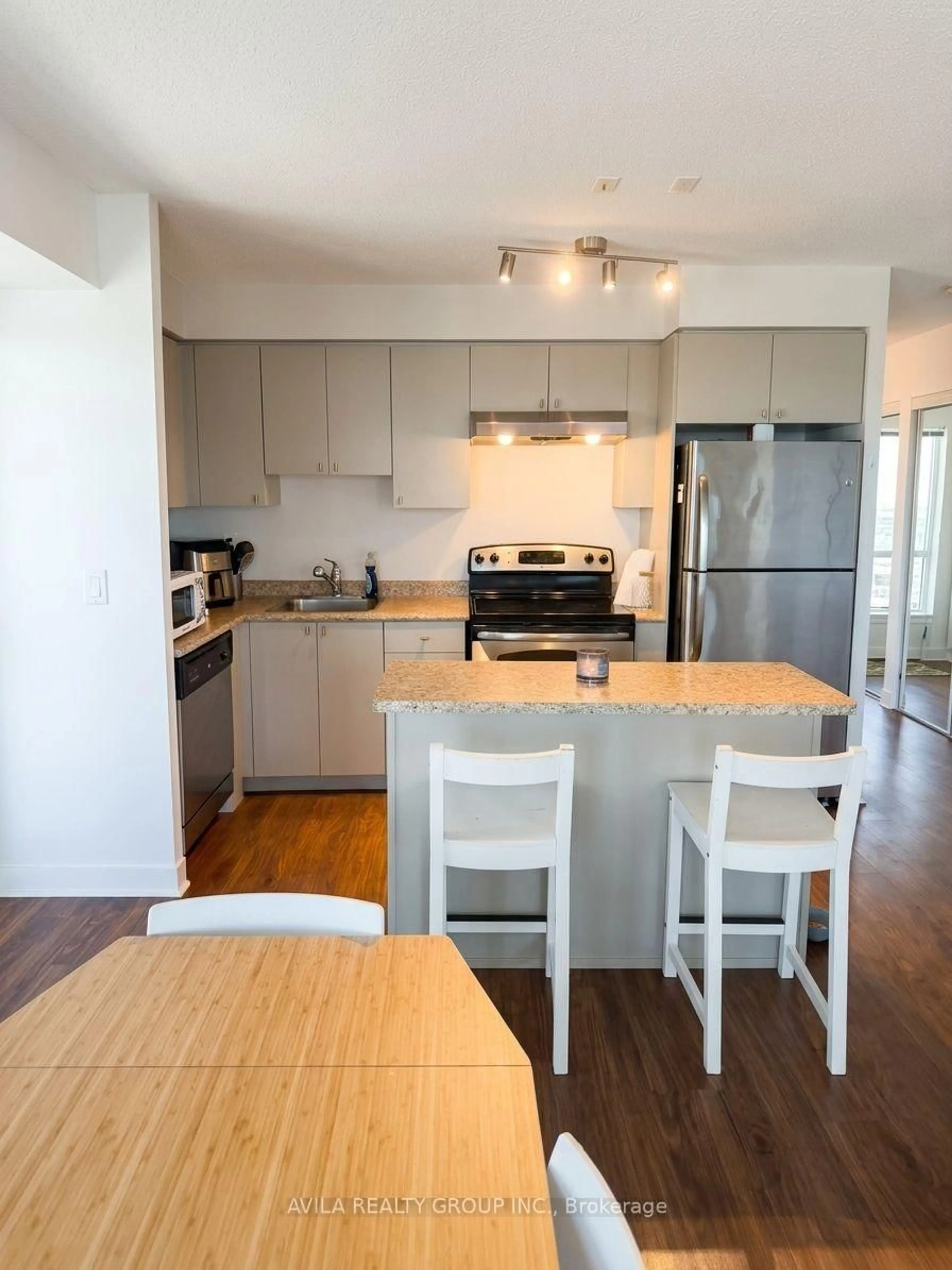 Open concept kitchen, wood/laminate floor for 155 Legion Rd #2108, Toronto Ontario M8Y 0A7