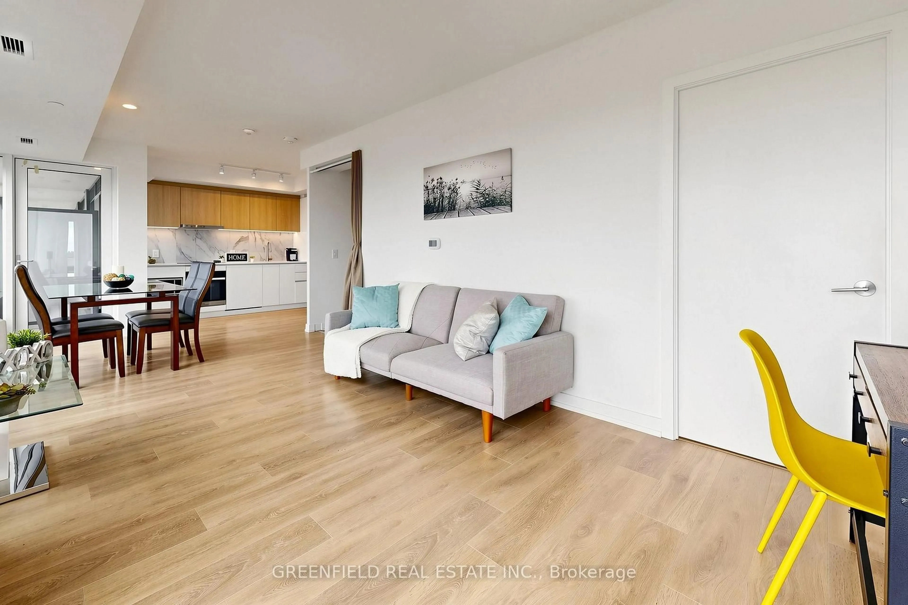 Living room with furniture, wood/laminate floor for 1100 Sheppard Ave #626, Toronto Ontario M3A 0G8