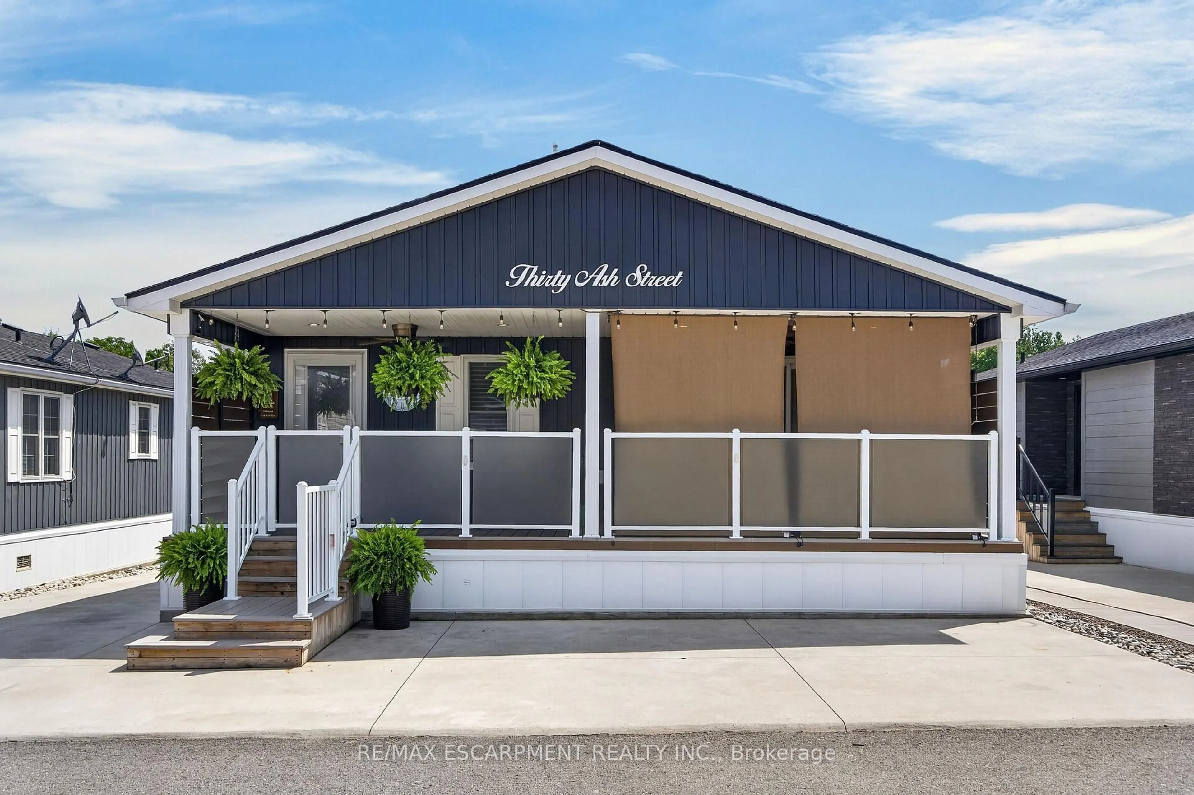 Home with vinyl exterior material, street for 4449 Milburough Line #30 Ash Street, Burlington Ontario L7P 0C5