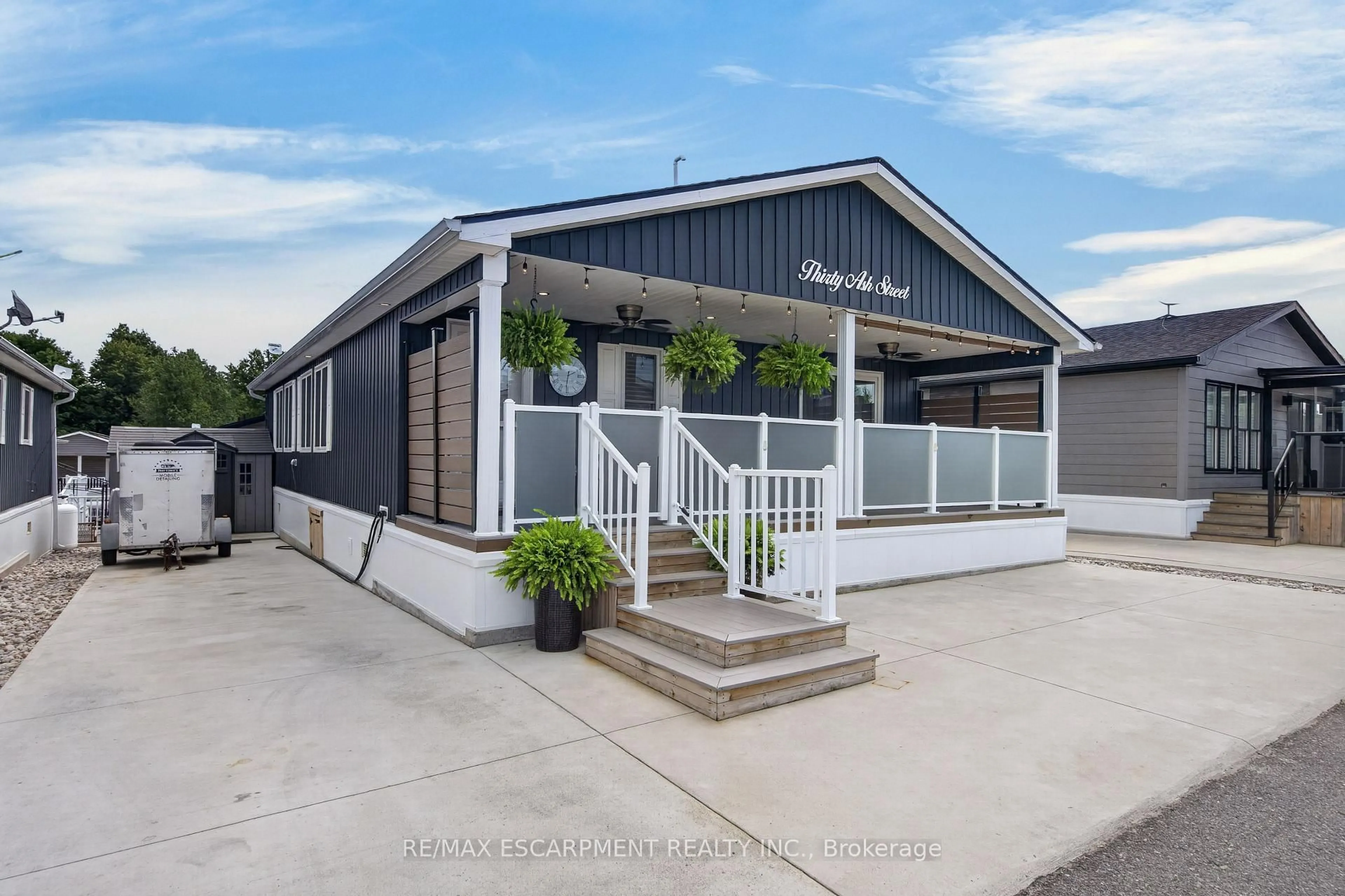 Home with vinyl exterior material, street for 4449 Milburough Line #30 Ash Street, Burlington Ontario L7P 0C5