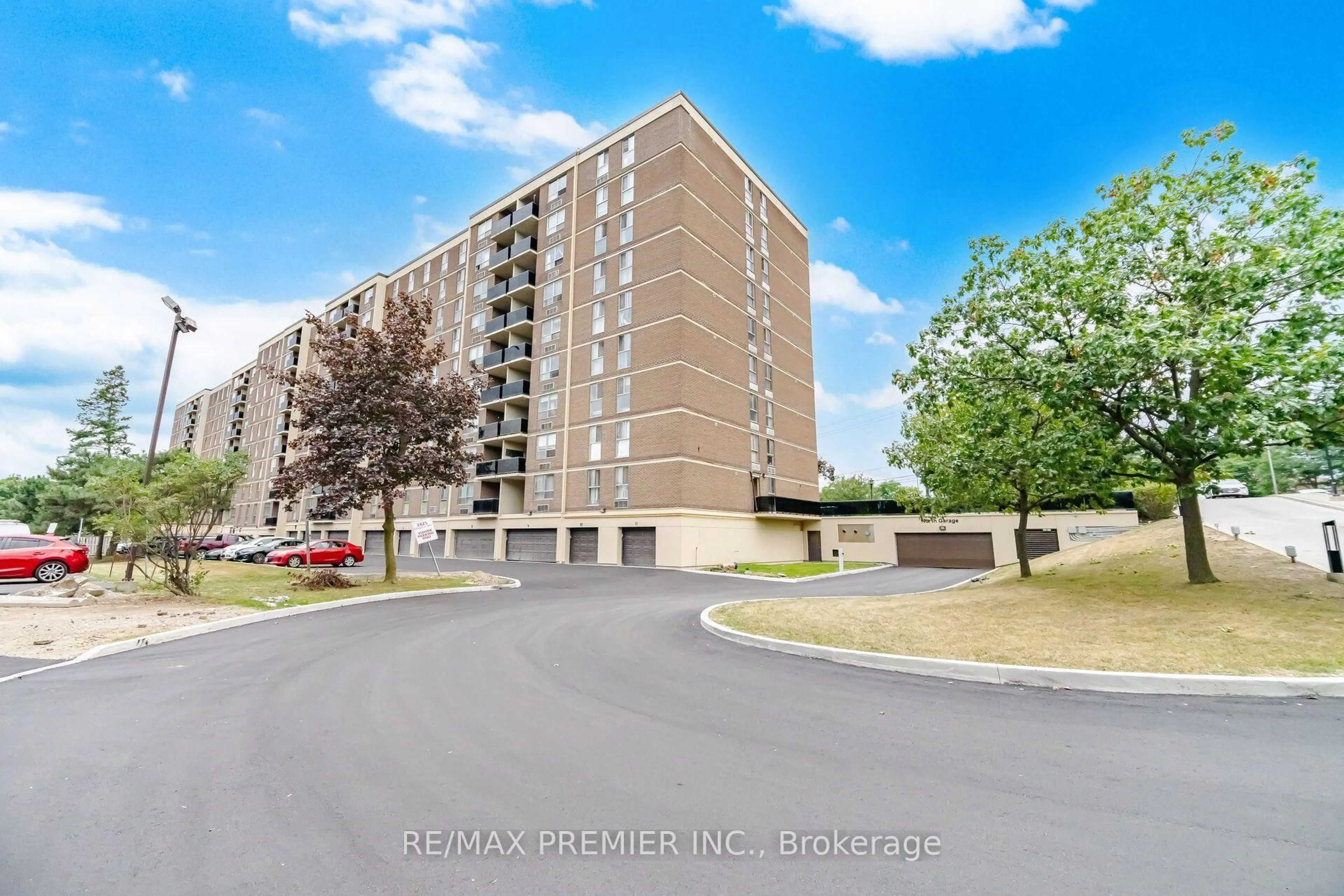 A pic from outside/outdoor area/front of a property/back of a property/a pic from drone, unknown for 2825 Islington Ave #406, Toronto Ontario M9L 2K1