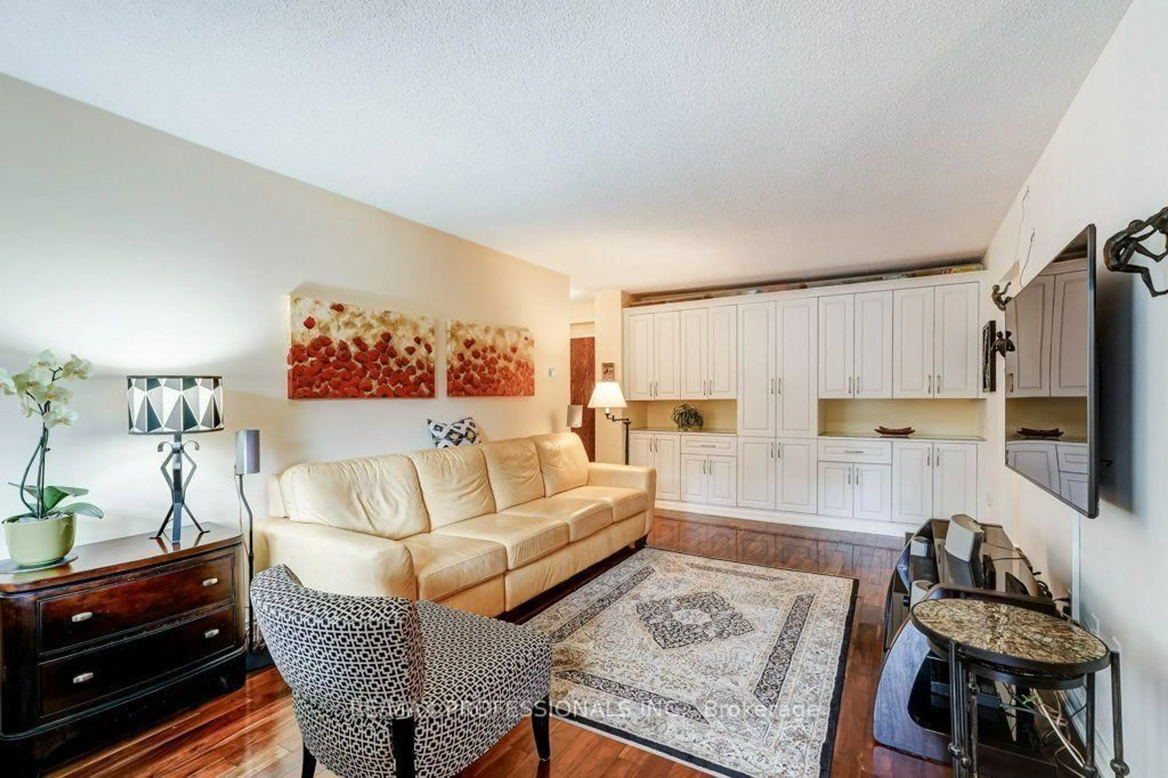 Living room with furniture, unknown for 420 Mill Rd #112, Toronto Ontario M9C 1Z1
