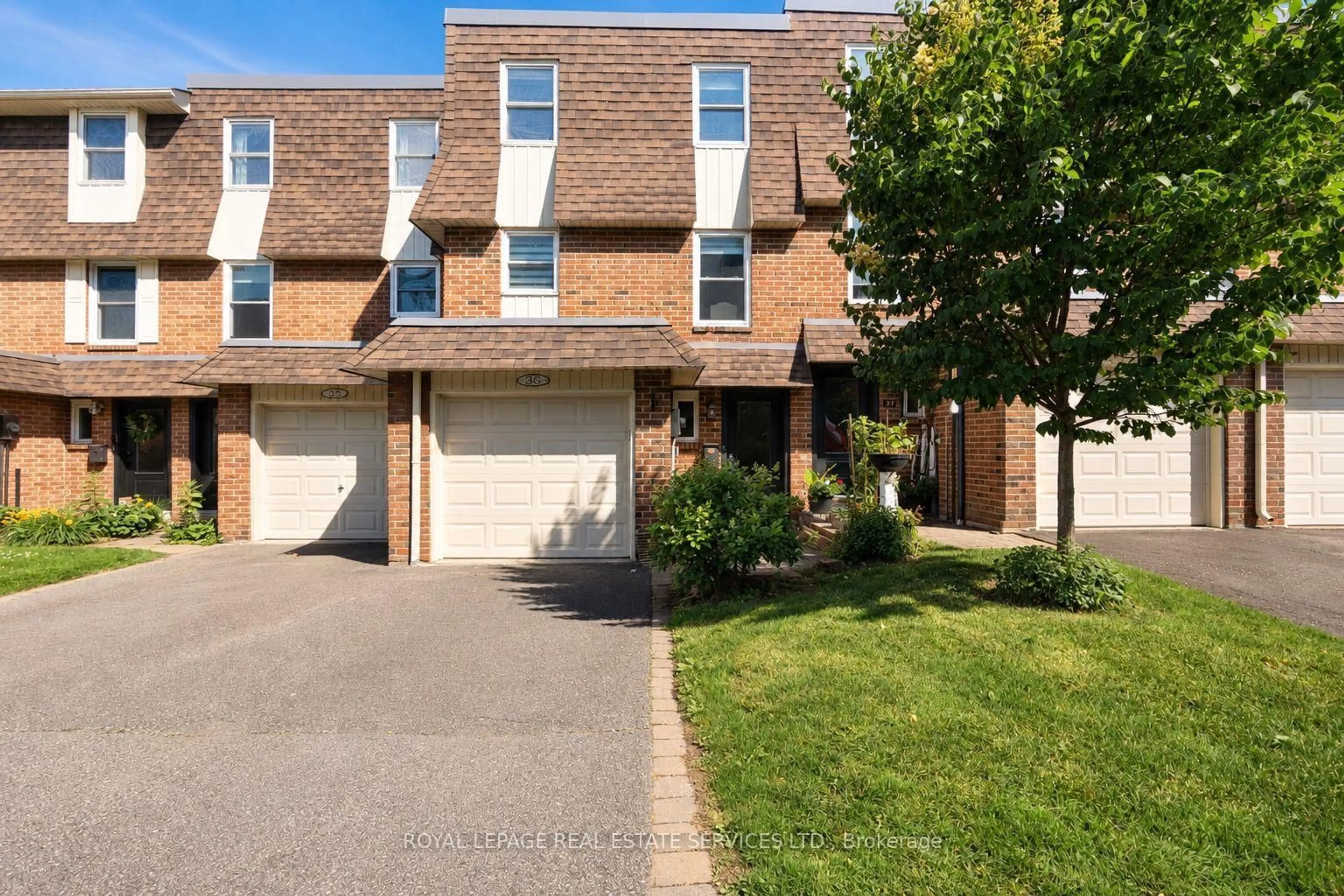 Home with brick exterior material, street for 30 Heslop Rd #36, Milton Ontario L9T 1B3