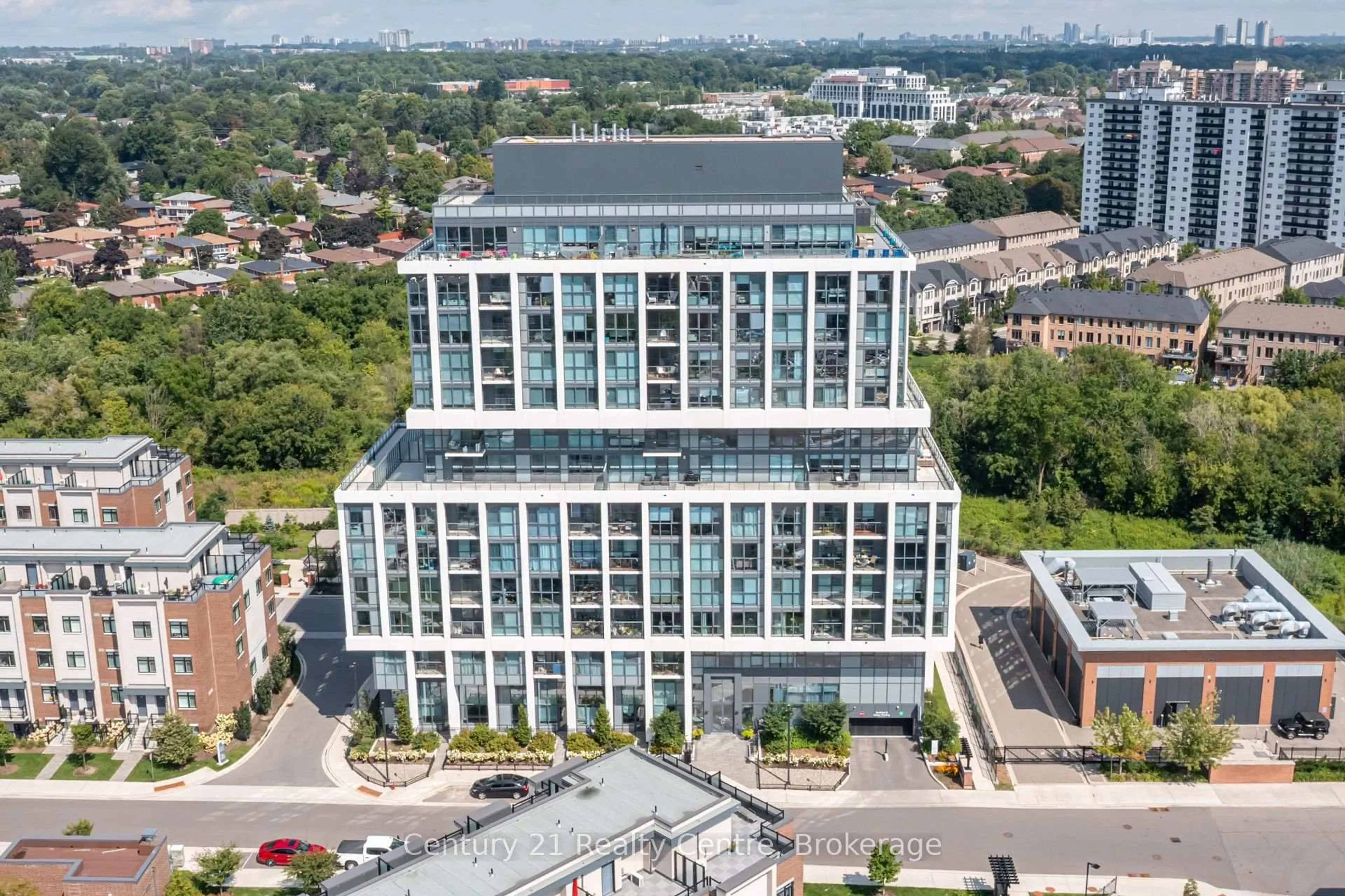 A pic from outside/outdoor area/front of a property/back of a property/a pic from drone, city buildings view from balcony for 1063 Douglas McCurdy Common #513, Mississauga Ontario L5G 0C5