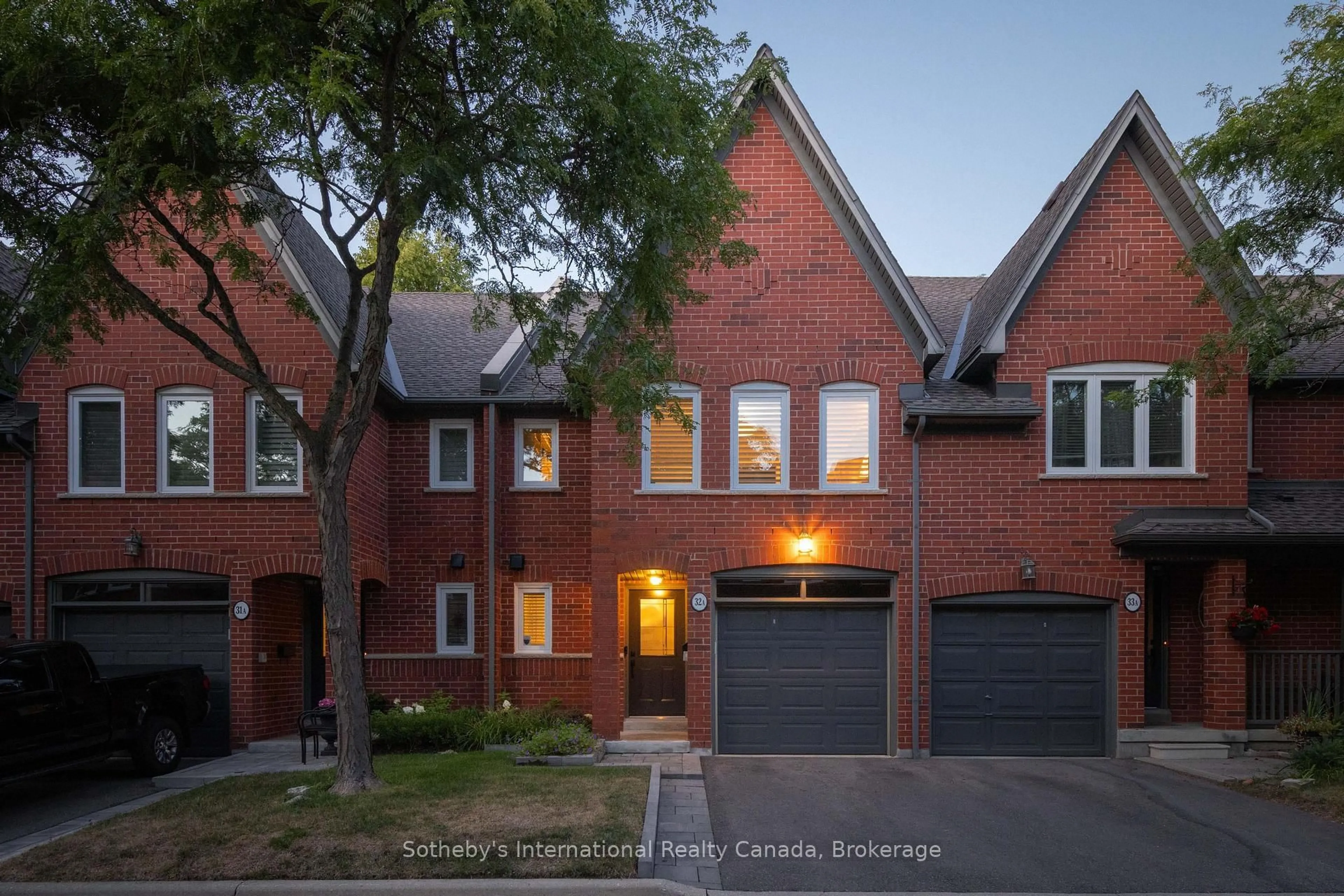 Home with brick exterior material, street for 1064 Queen St #32A, Mississauga Ontario L5H 4K3