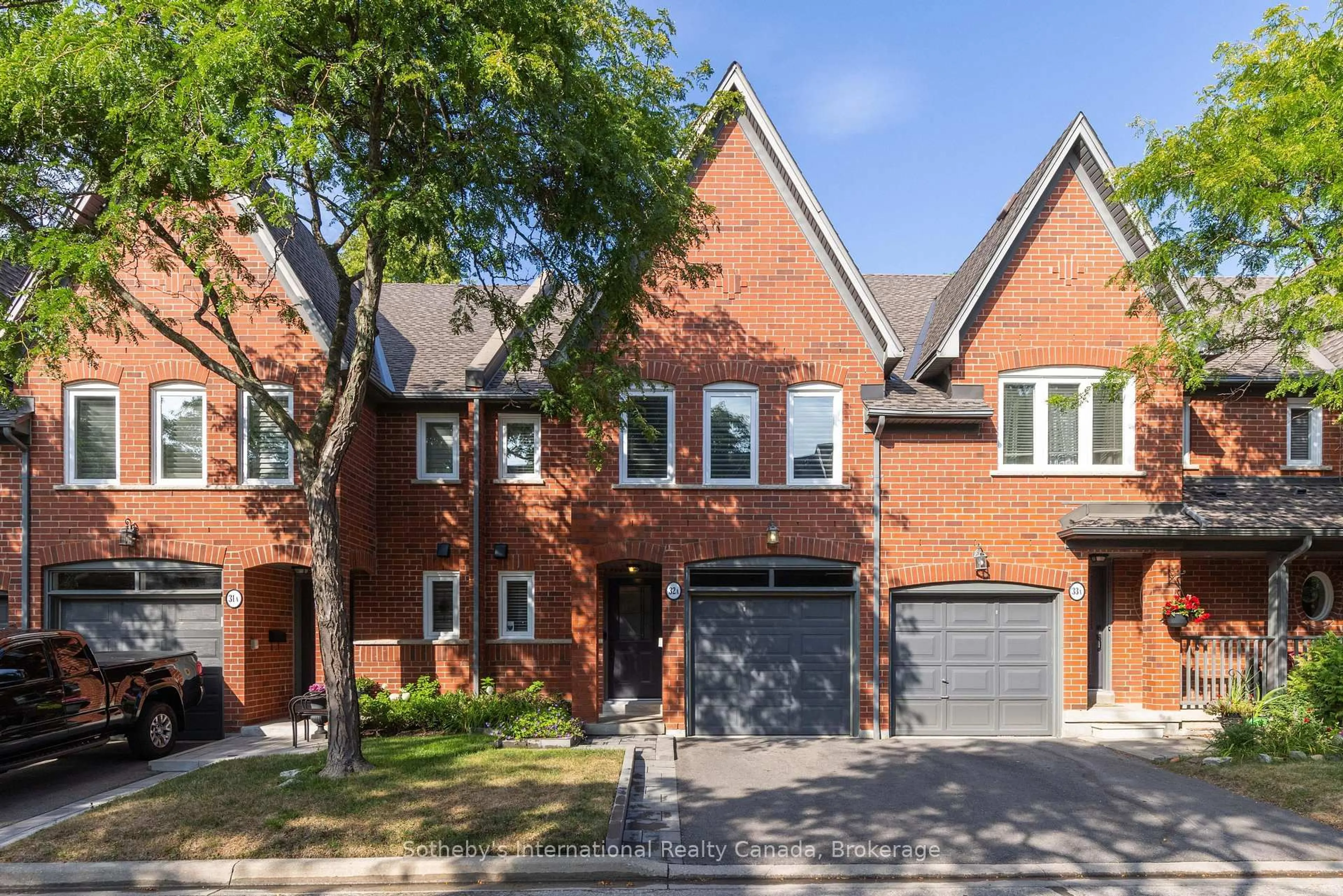 Home with brick exterior material, street for 1064 Queen St #32A, Mississauga Ontario L5H 4K3