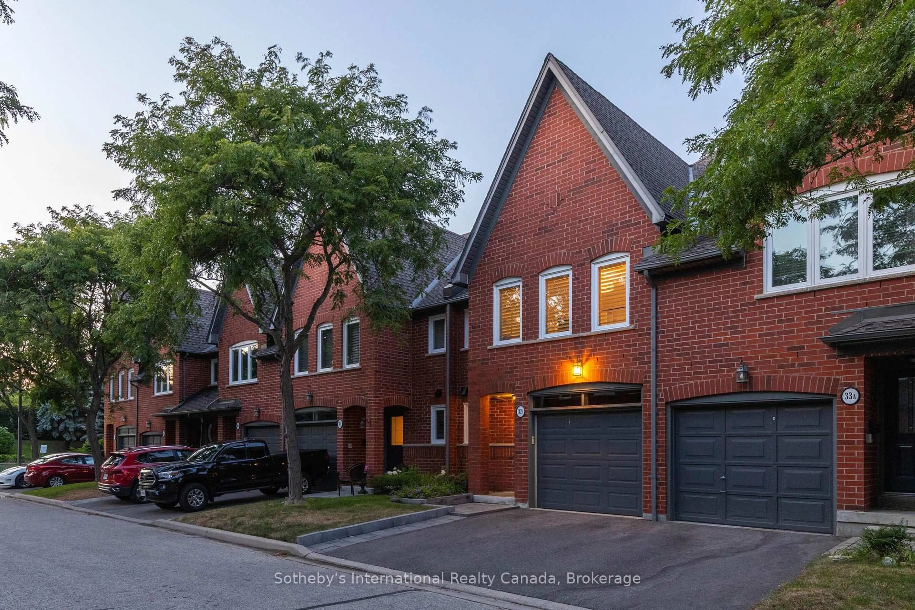 Home with brick exterior material, street for 1064 Queen St #32A, Mississauga Ontario L5H 4K3