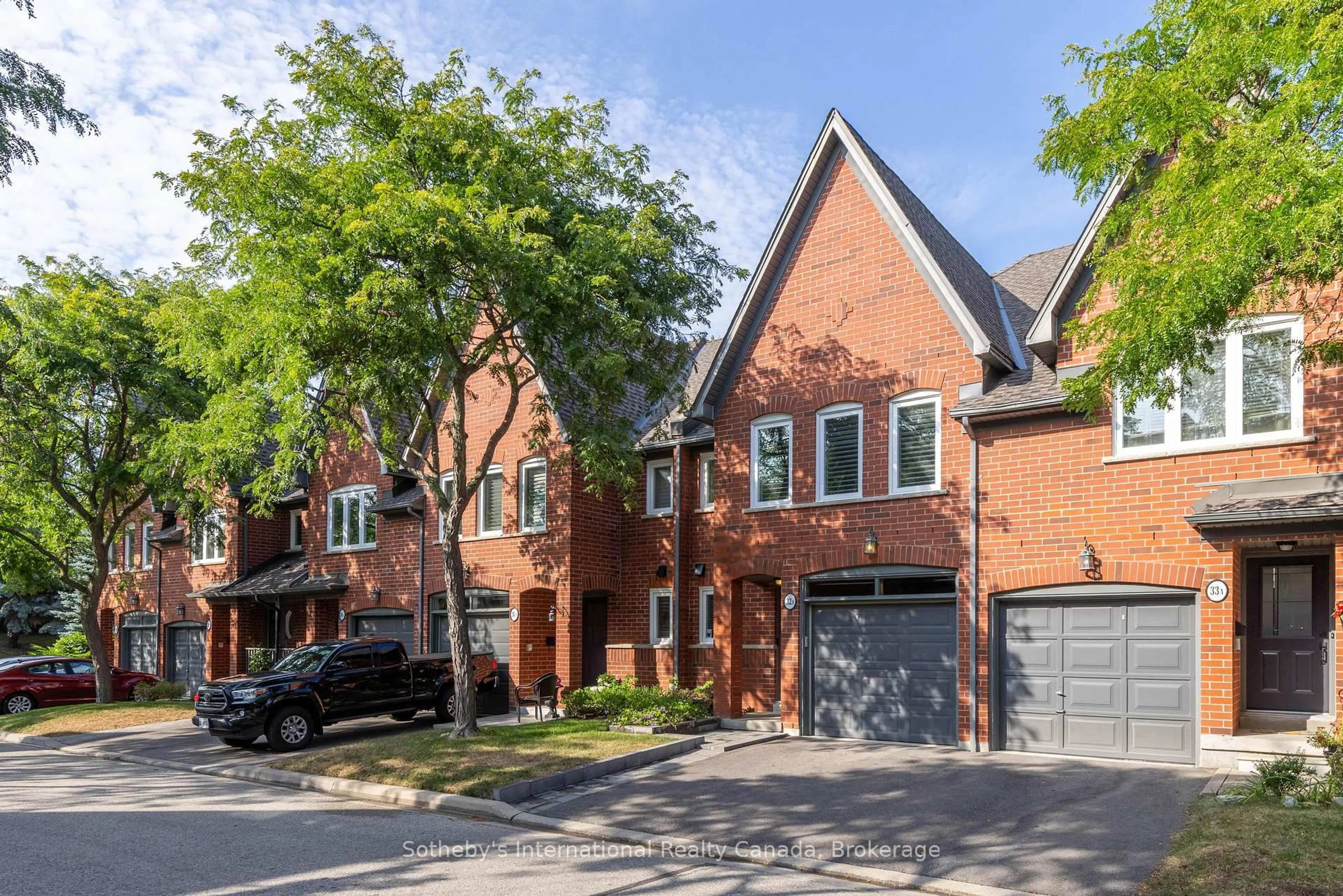 Home with brick exterior material, street for 1064 Queen St #32A, Mississauga Ontario L5H 4K3