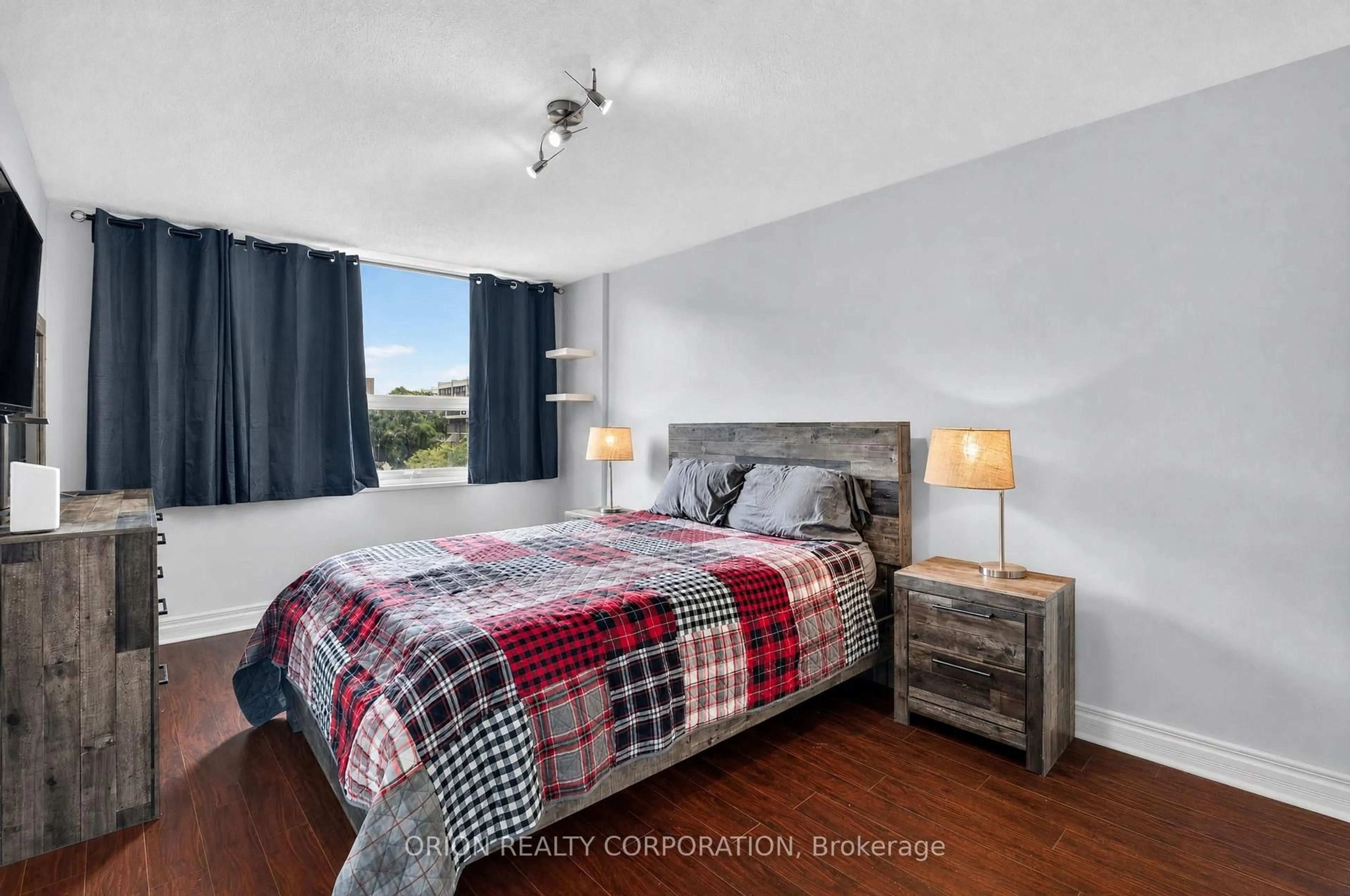 Bedroom with bed, wood/laminate floor for 362 The East Mall #309, Toronto Ontario M9B 6C4