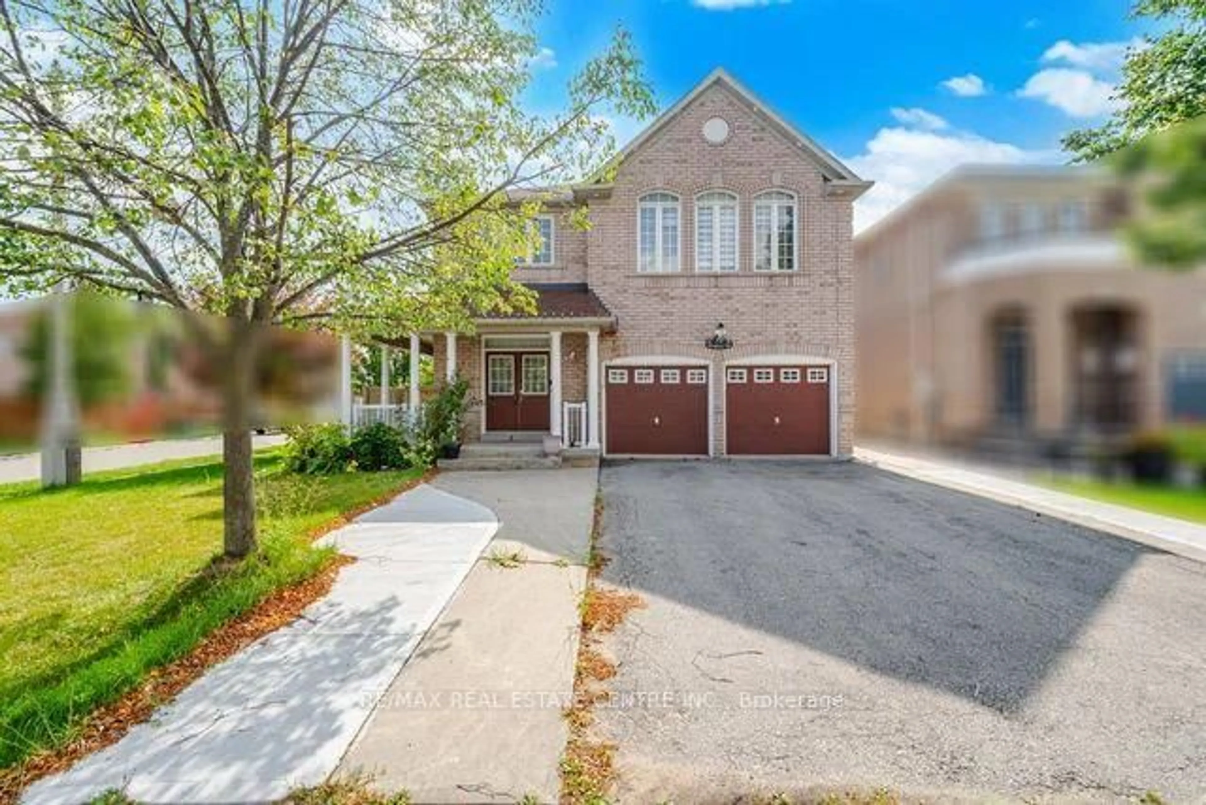 Home with brick exterior material, street for 32 Midnightsun Tr, Brampton Ontario L6R 3K3