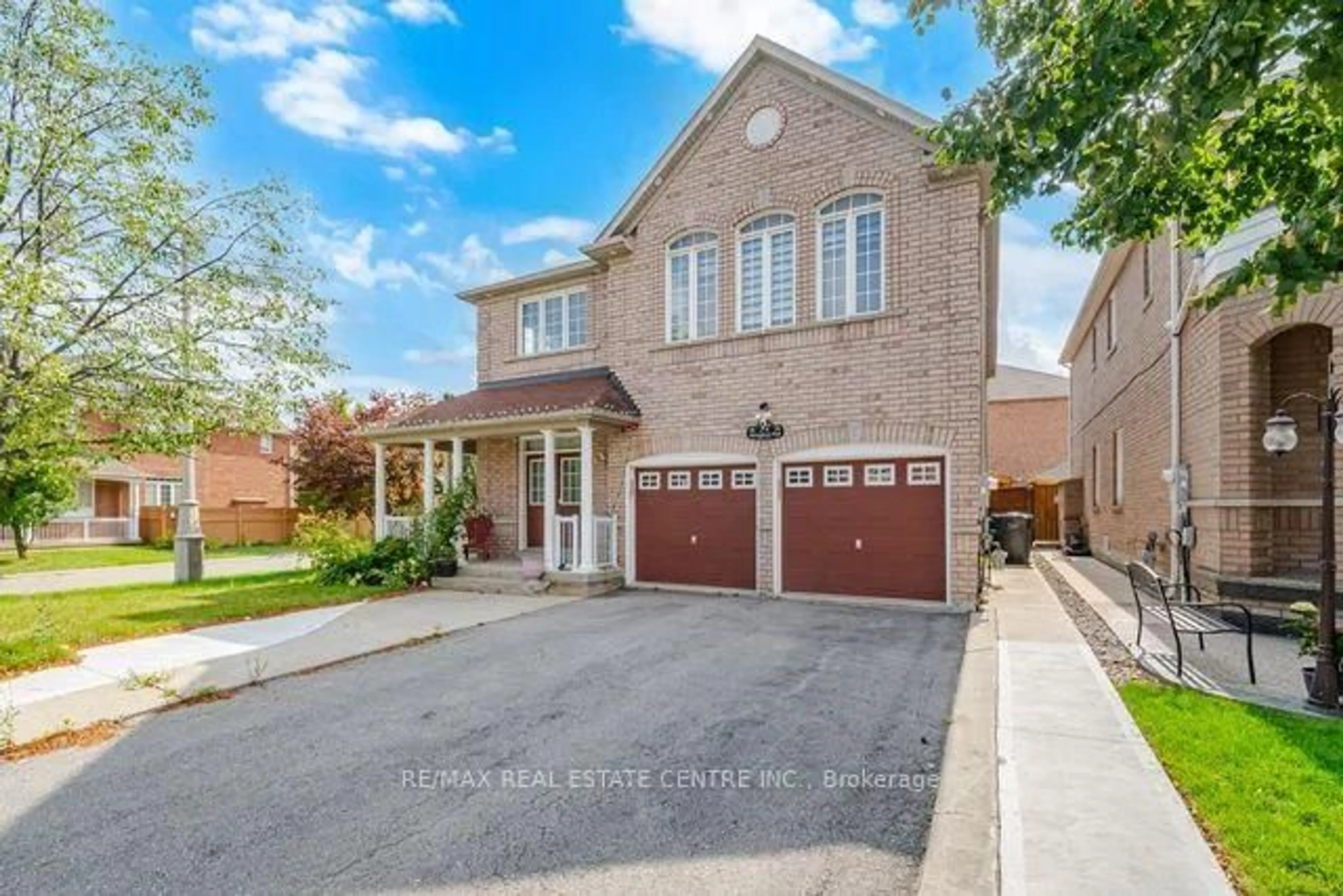 Home with brick exterior material, street for 32 Midnightsun Tr, Brampton Ontario L6R 3K3