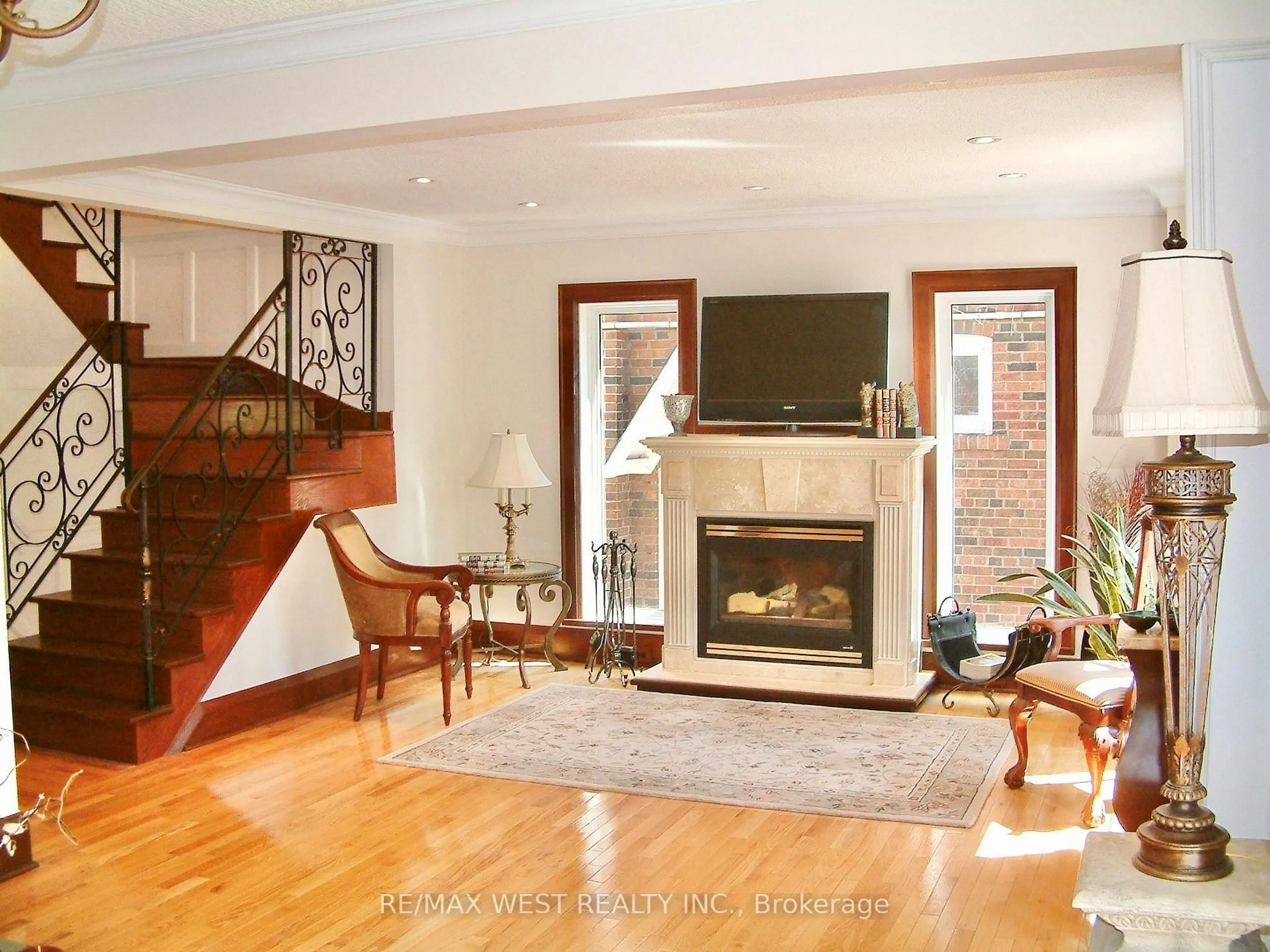 Living room with furniture, wood/laminate floor for 15 Wendover Rd, Toronto Ontario M8X 2L1