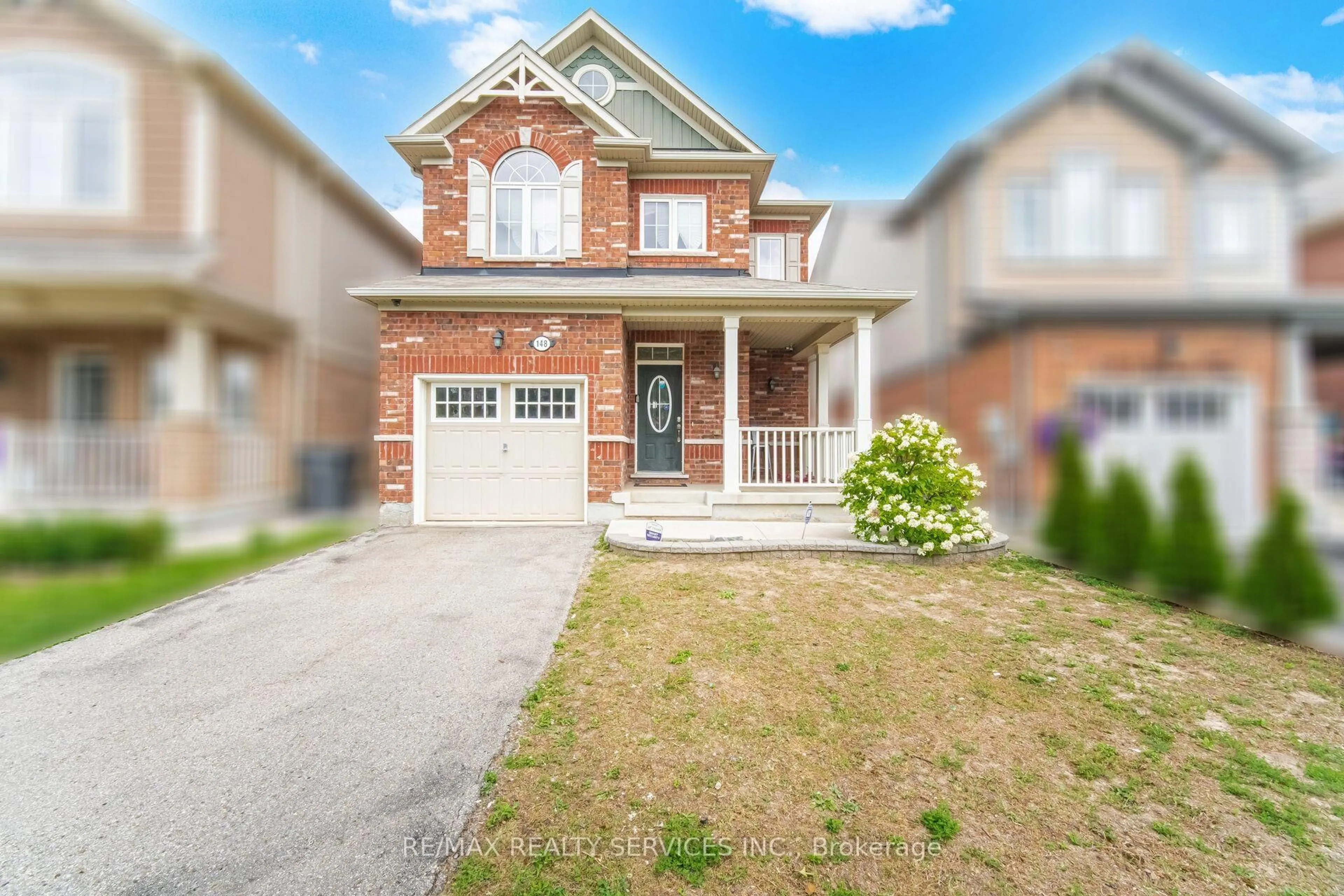 Home with brick exterior material, street for 148 Miracle Tr, Brampton Ontario L7A 0Y9