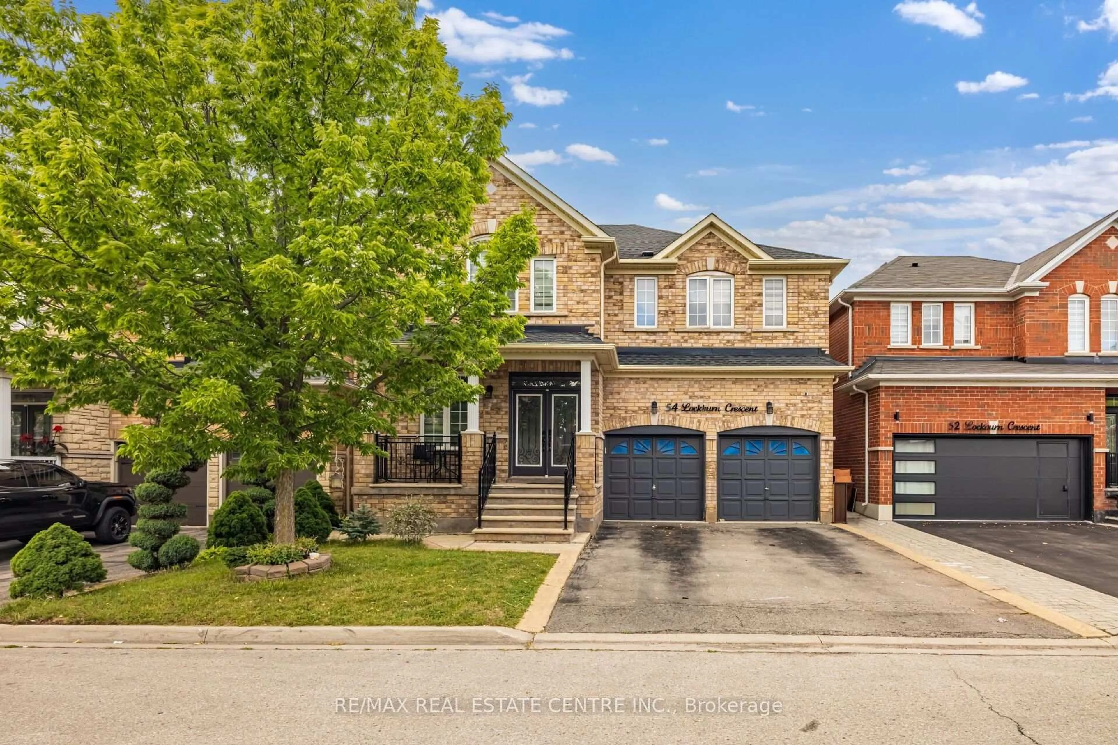 Home with brick exterior material, street for 54 Lockburn Cres, Brampton Ontario L7A 3W8