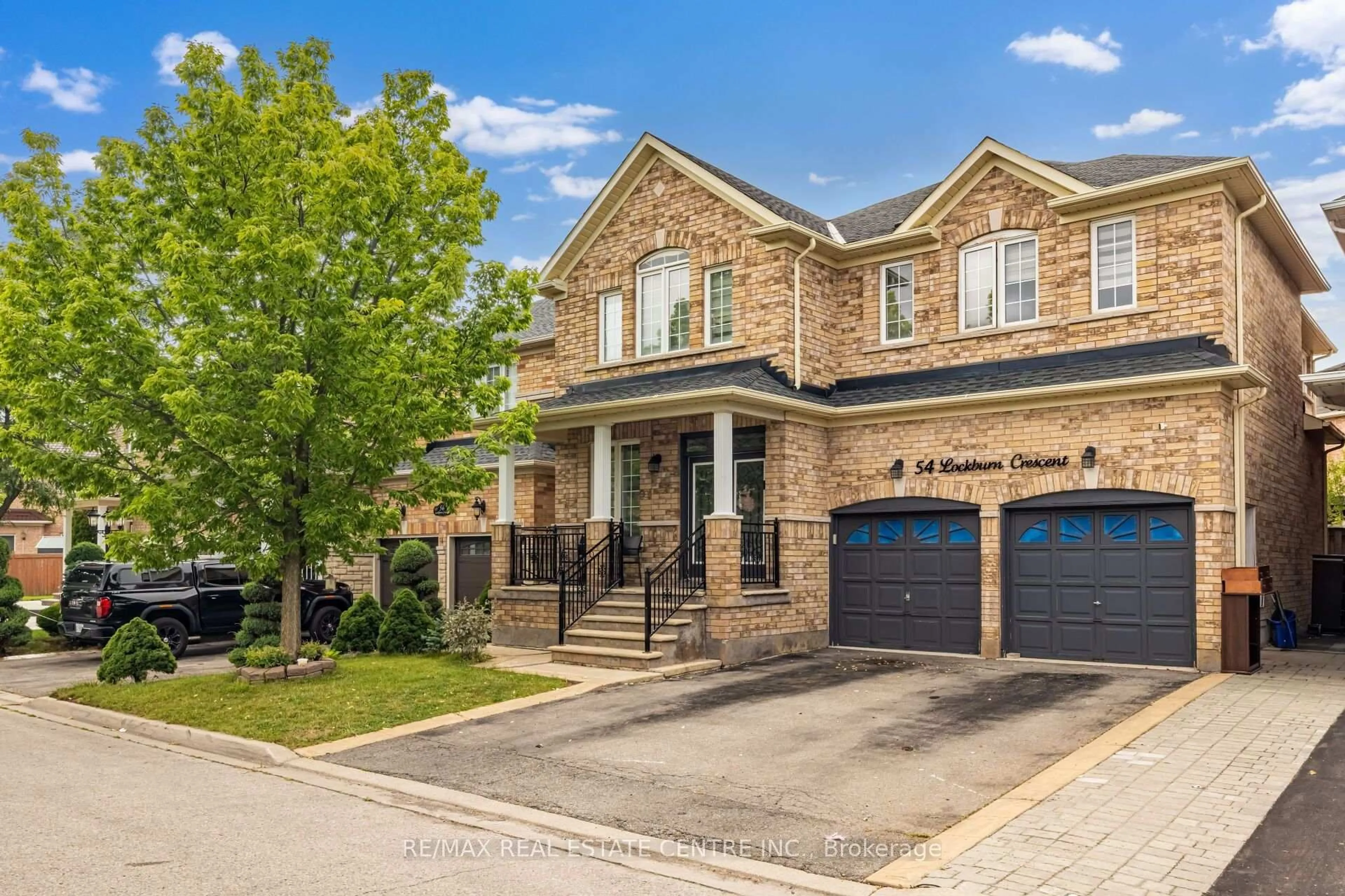 Home with brick exterior material, street for 54 Lockburn Cres, Brampton Ontario L7A 3W8