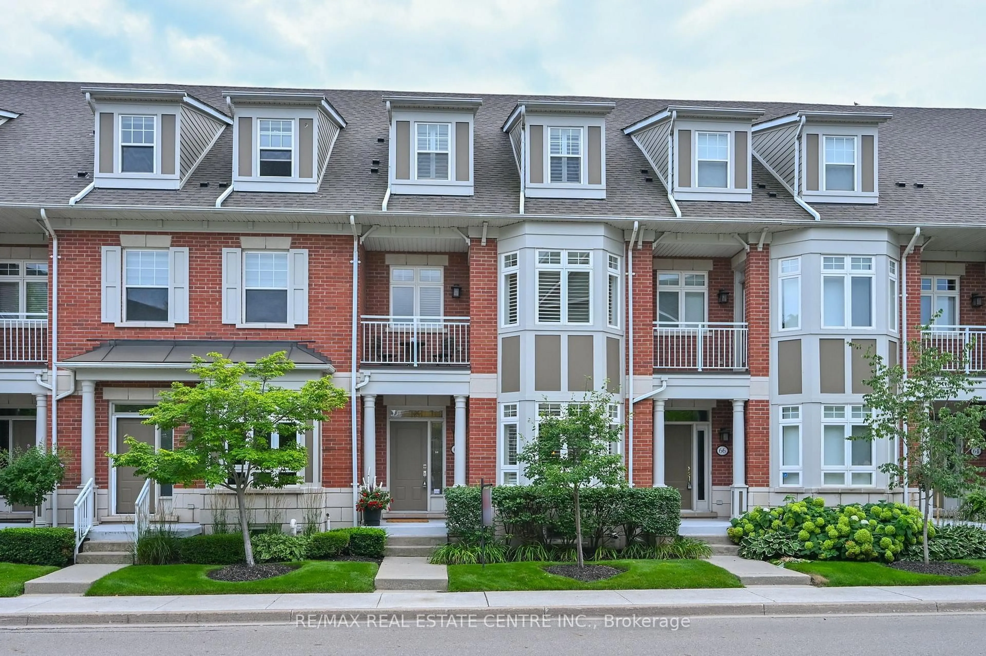 Home with brick exterior material, street for 68 Compass Way #43, Mississauga Ontario L5G 4T8
