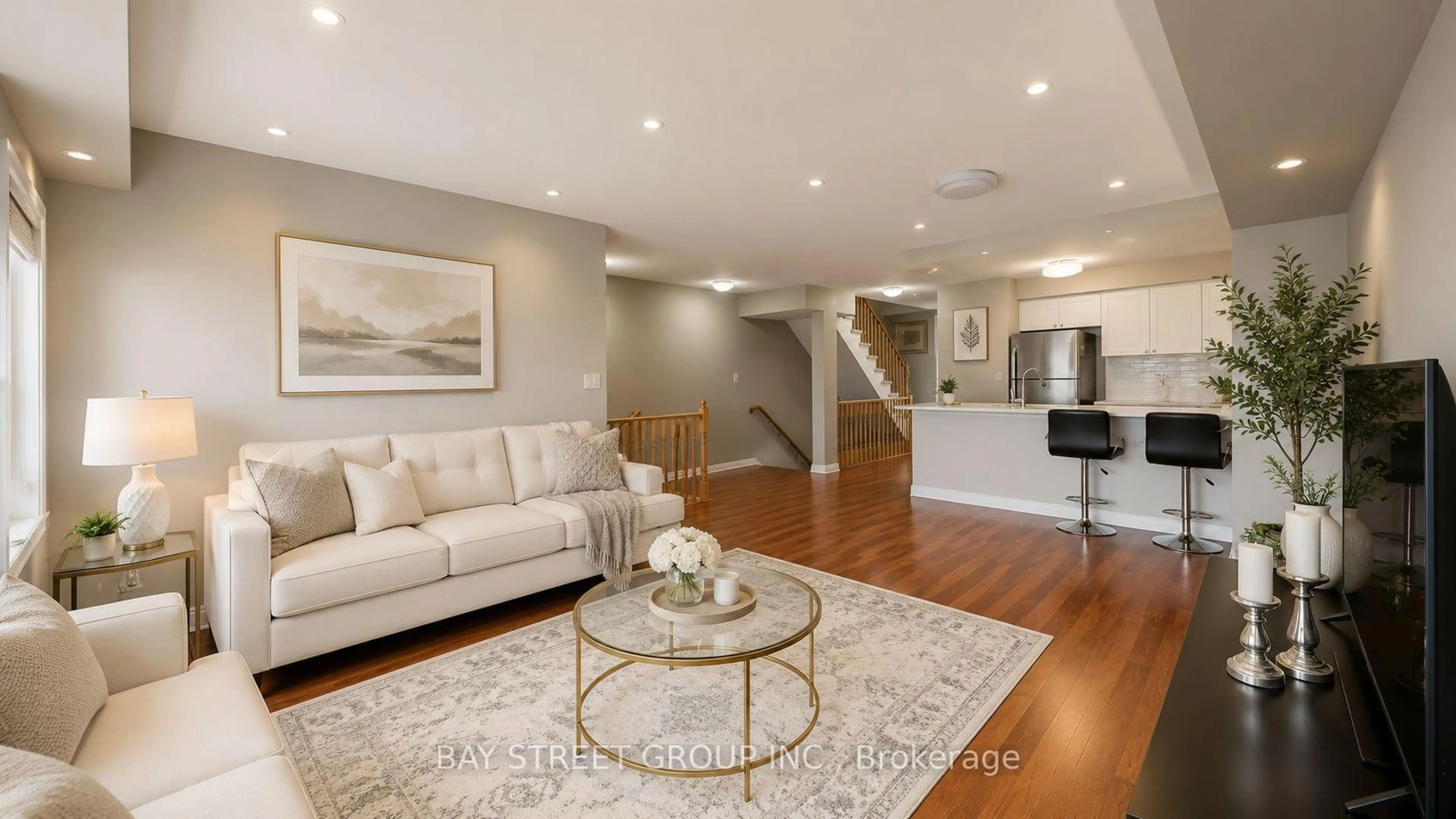 Living room with furniture, wood/laminate floor for 3975 Eglinton Ave #13, Mississauga Ontario L5M 0E7