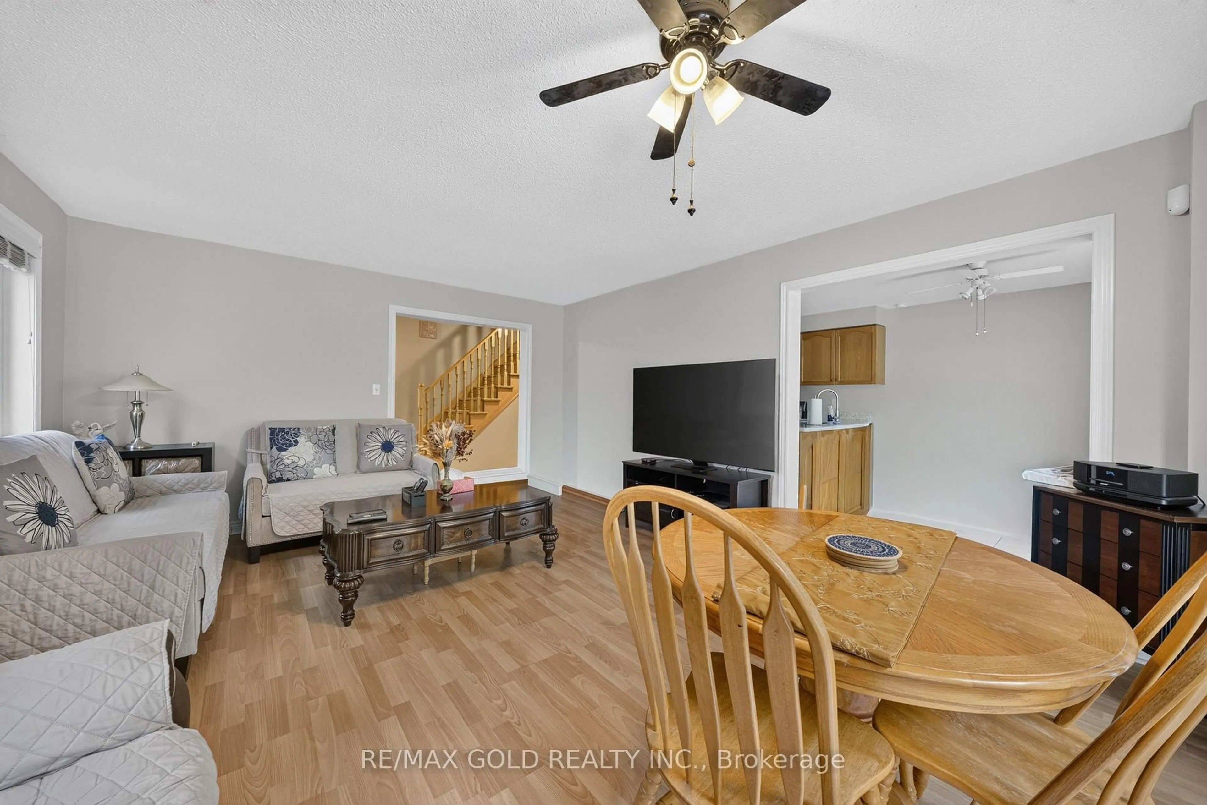 Living room with furniture, unknown for 142 Pressed Brick Dr, Brampton Ontario L6V 4K6