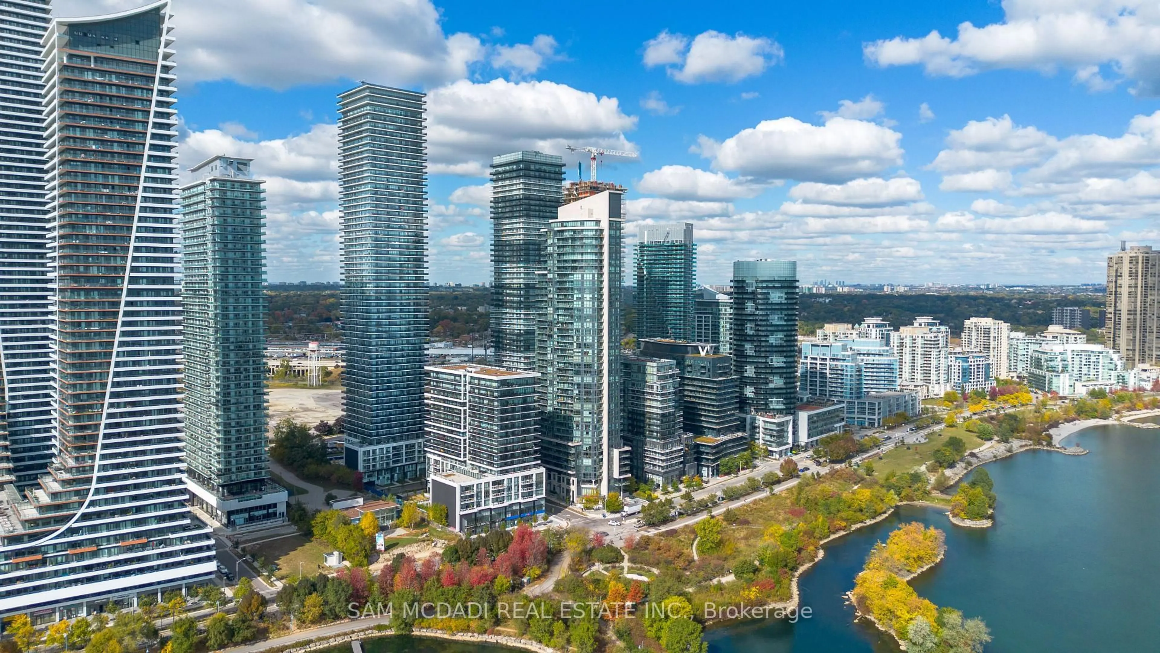 A pic from outside/outdoor area/front of a property/back of a property/a pic from drone, city buildings view from balcony for 70 Annie Craig Dr #414, Toronto Ontario M8V 0G2