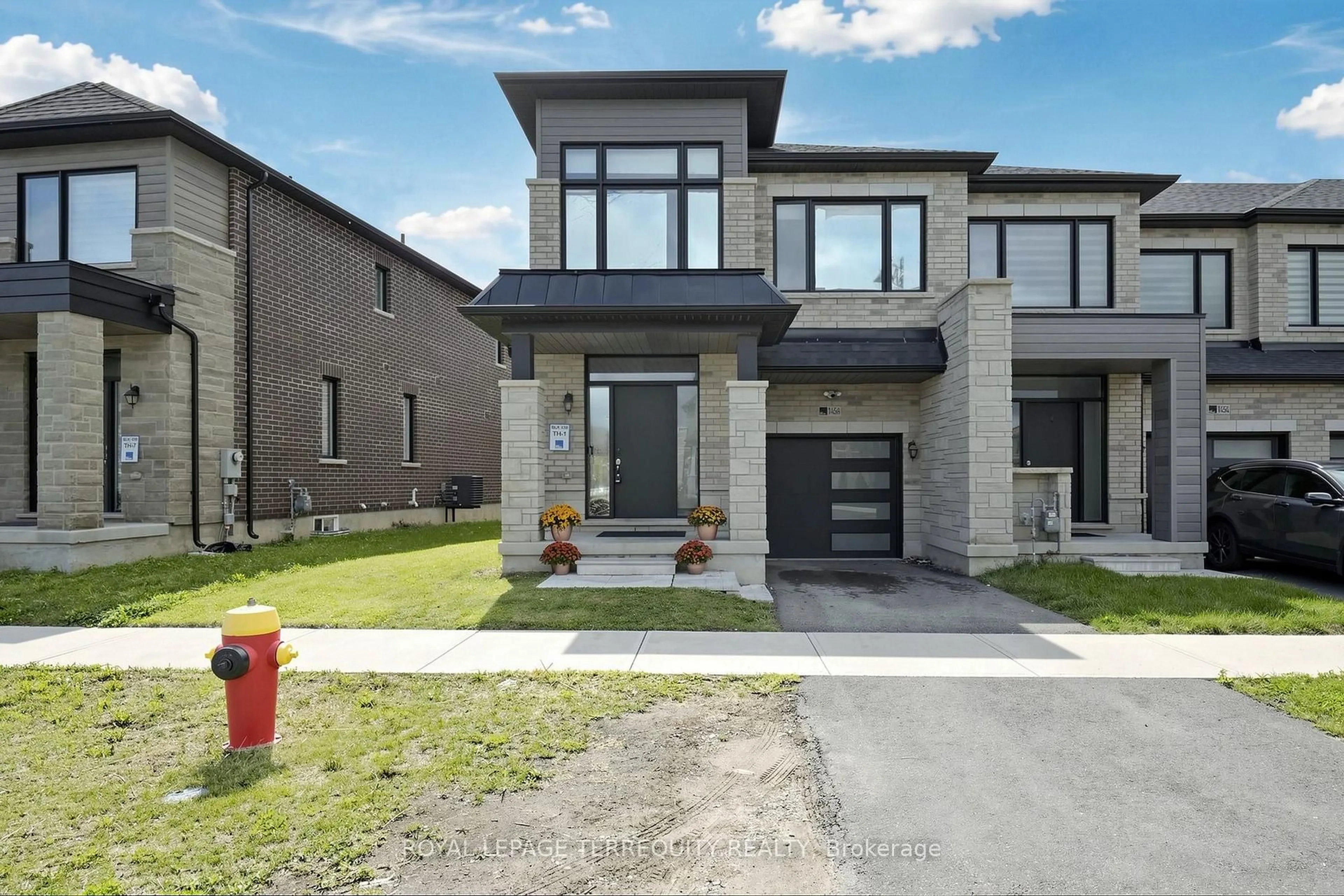 Home with brick exterior material, street for 1456 Rose Way, Milton Ontario L9T 7E7