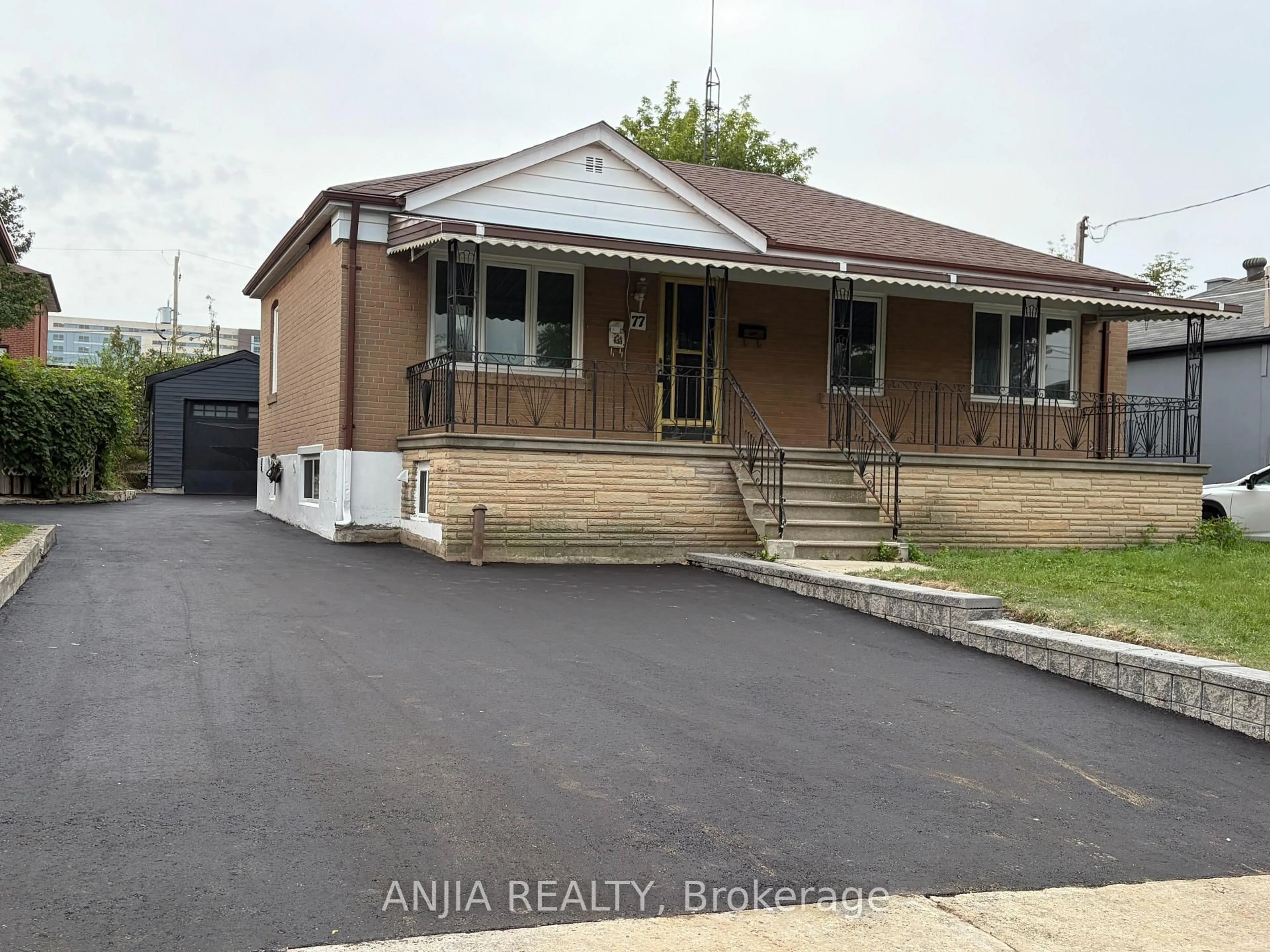 Home with vinyl exterior material, street for 77 Nash Dr, Toronto Ontario M3M 2L6