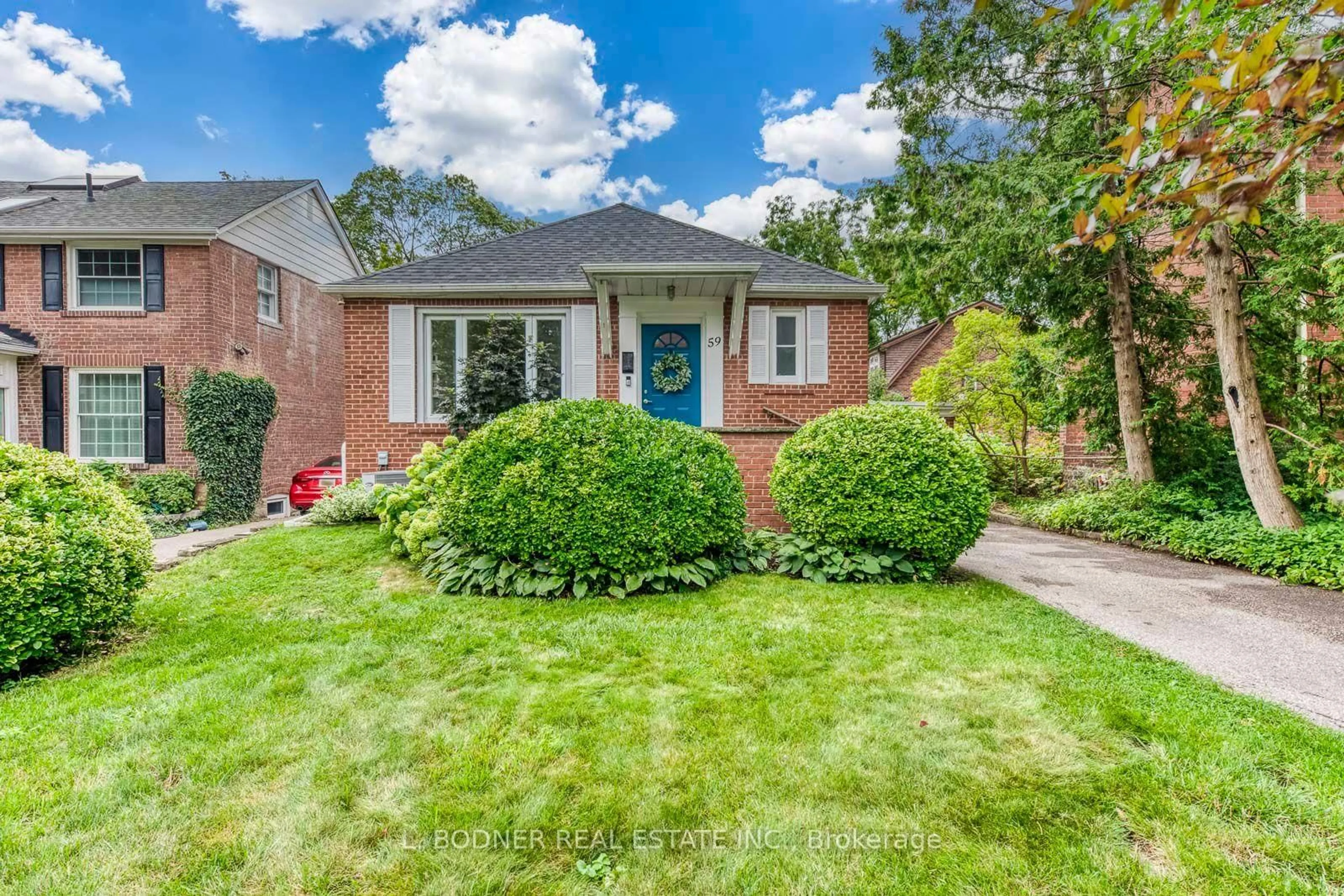 Home with brick exterior material, street for 59 Queens Dr, Toronto Ontario M9N 2H5