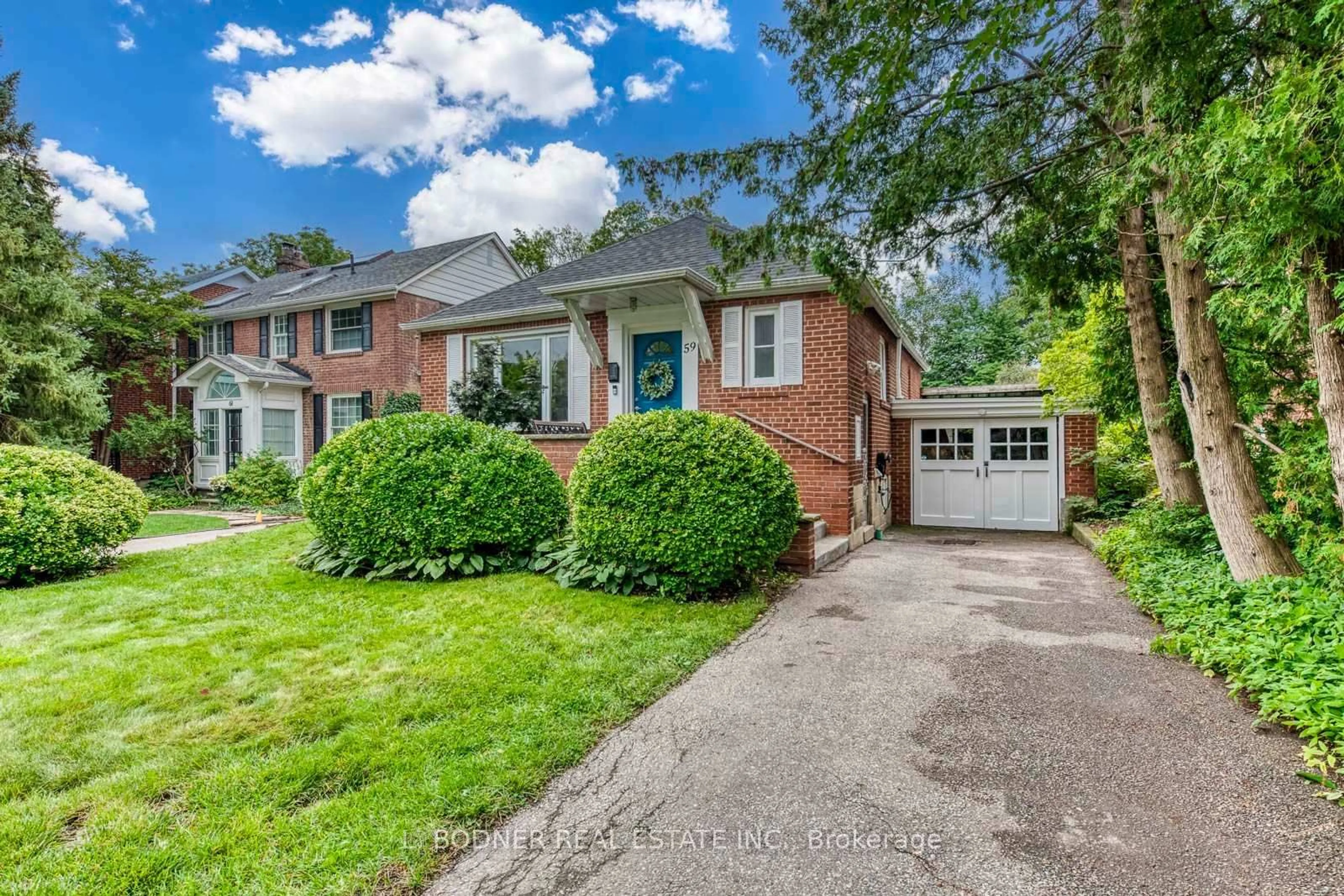 Home with brick exterior material, street for 59 Queens Dr, Toronto Ontario M9N 2H5