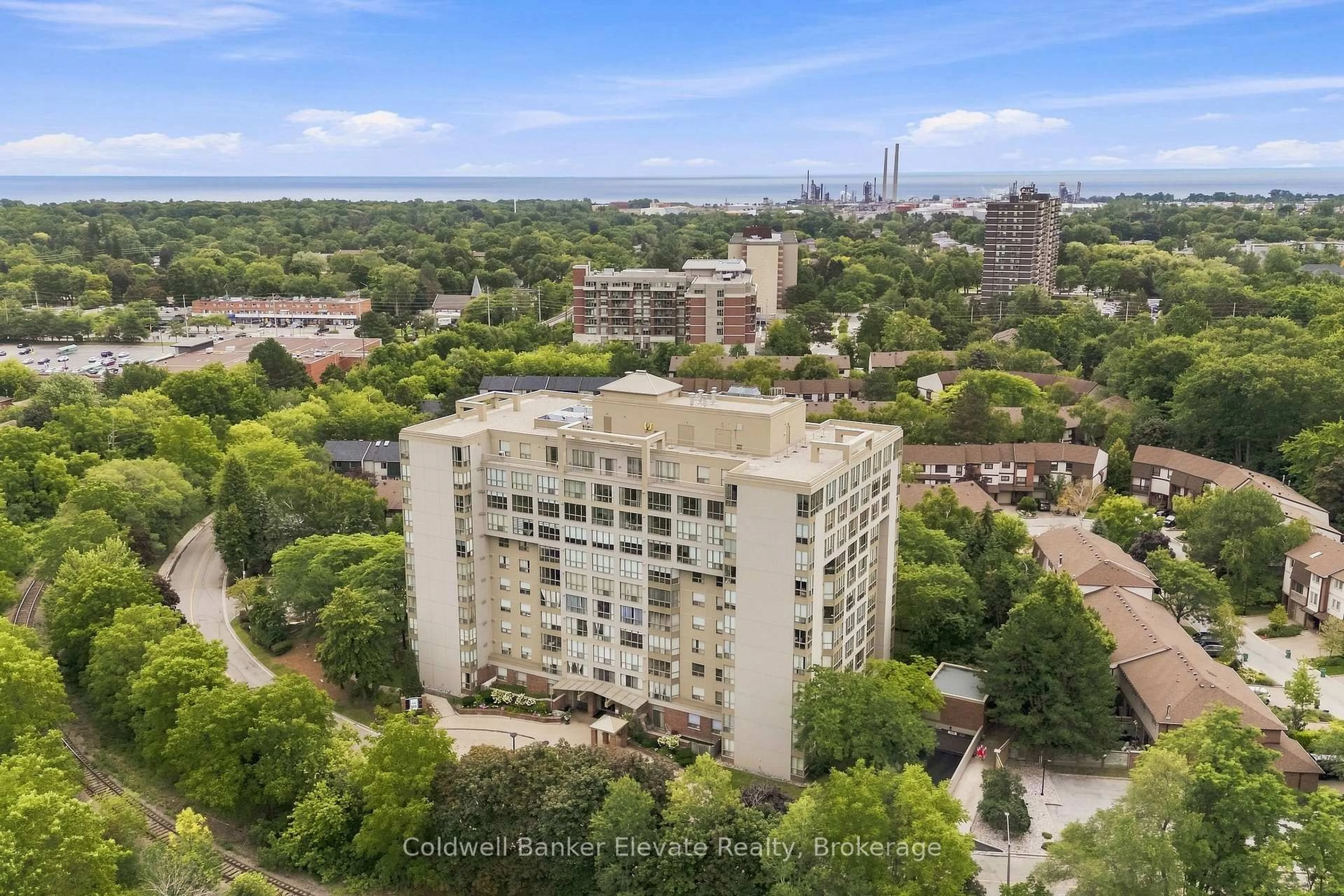 A pic from outside/outdoor area/front of a property/back of a property/a pic from drone, city buildings view from balcony for 1110 Walden Circ #312, Mississauga Ontario L5J 4R3
