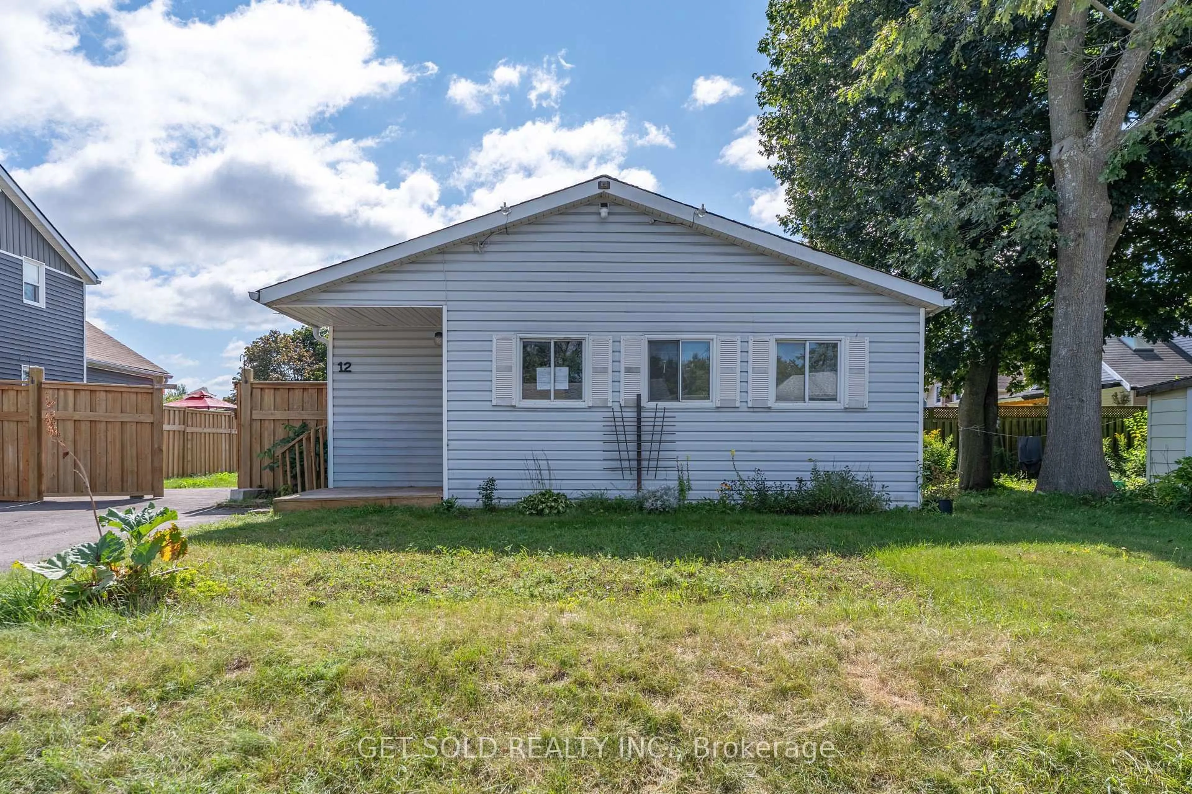 Home with vinyl exterior material, street for 12 Vimy St, Halton Hills Ontario L7J 1S1