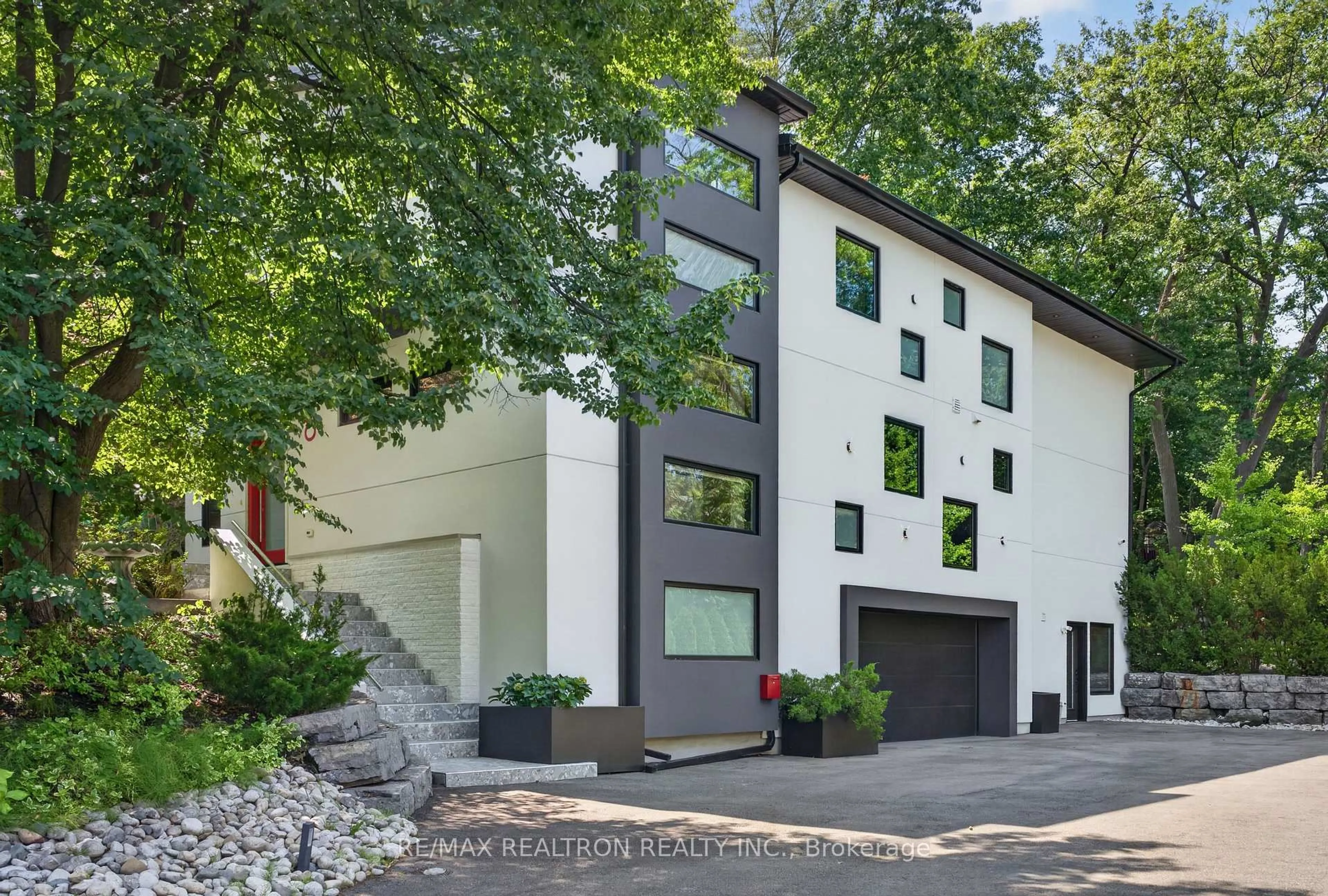 Home with brick exterior material, street for 8 Breezewood Dr, Toronto Ontario M8Y 2C1
