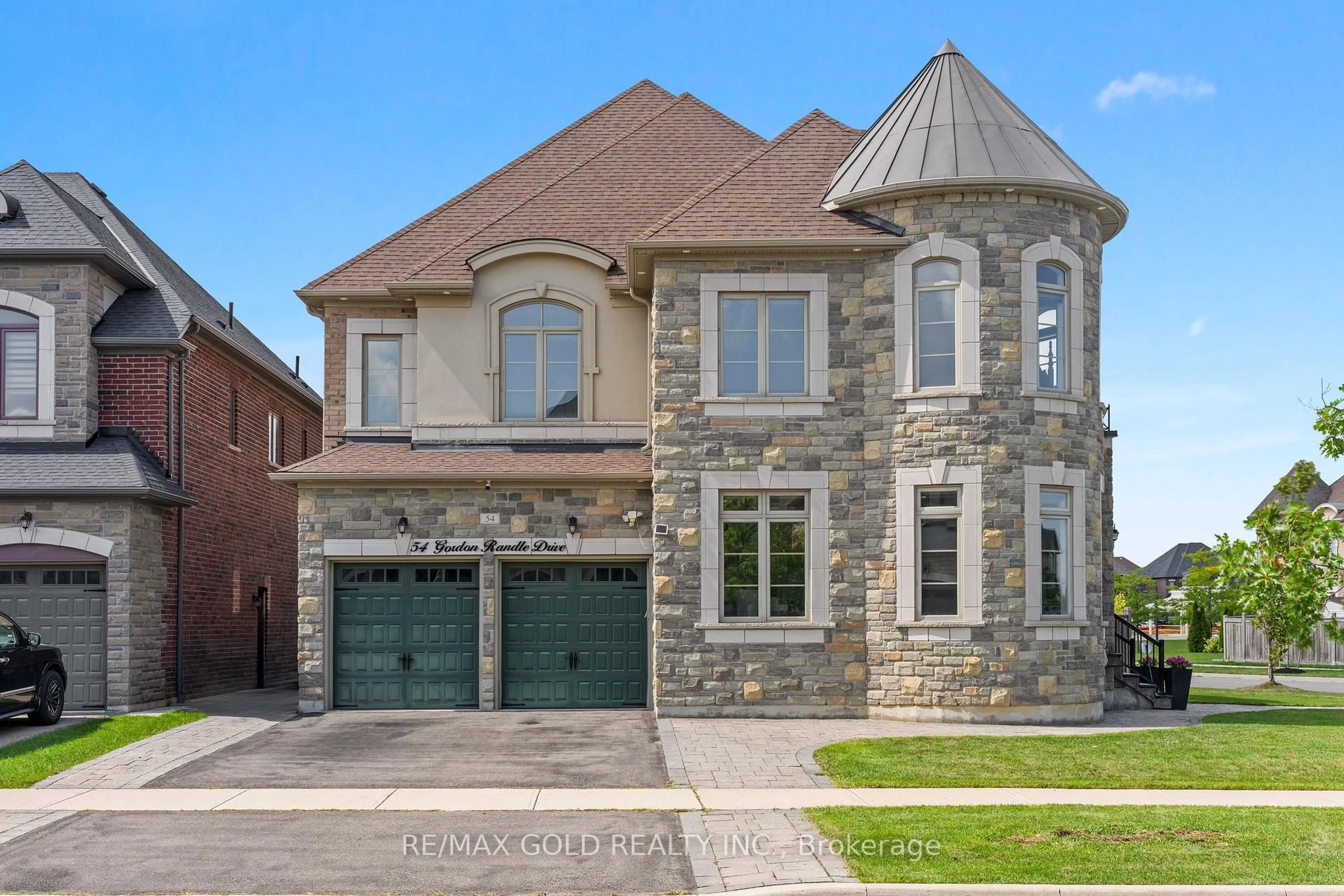 Home with brick exterior material, street for 54 Gordon Randle Dr, Brampton Ontario L6P 4H3