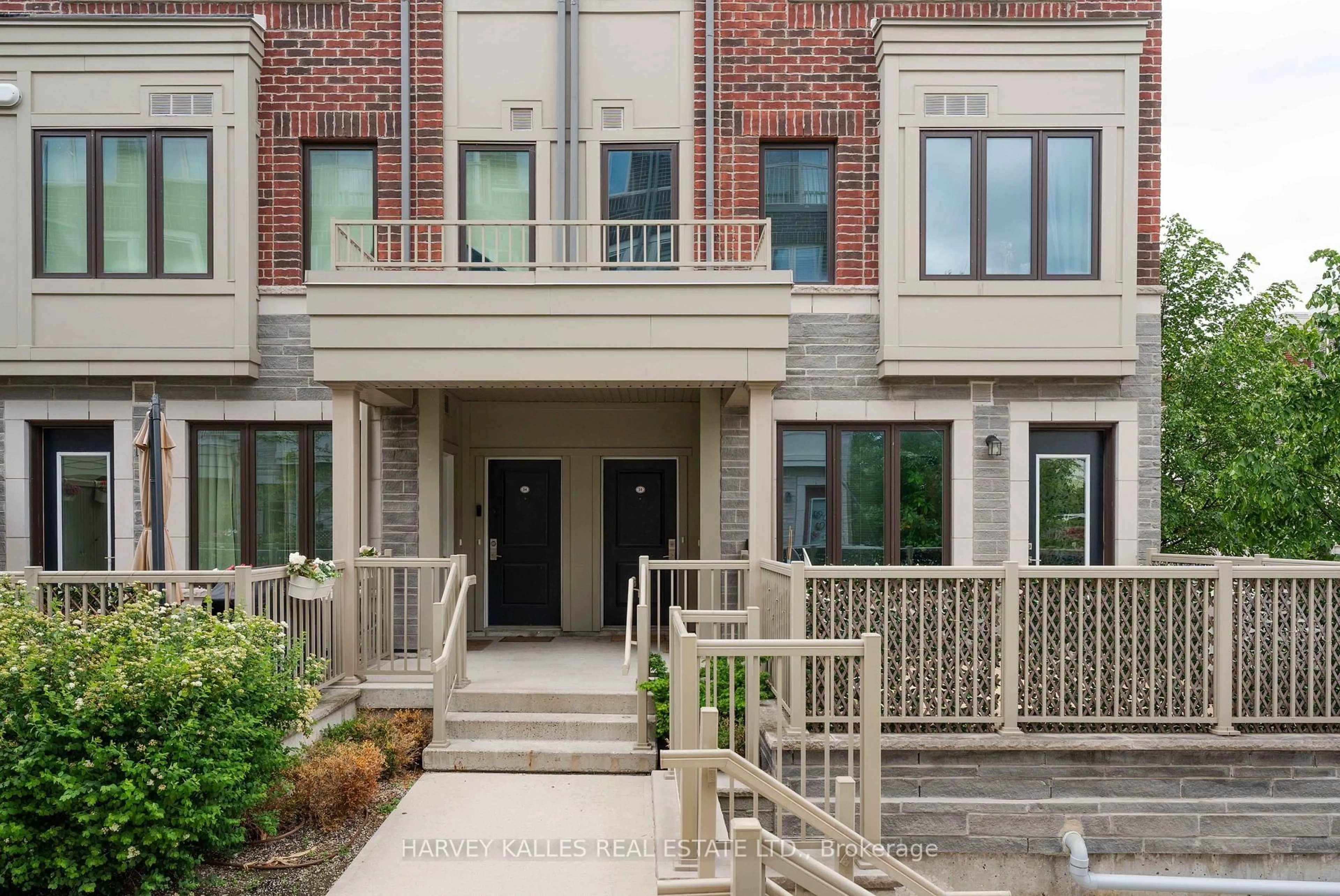Home with brick exterior material, street for 85 Eastwood Park Gdns #35, Toronto Ontario M8W 0B9