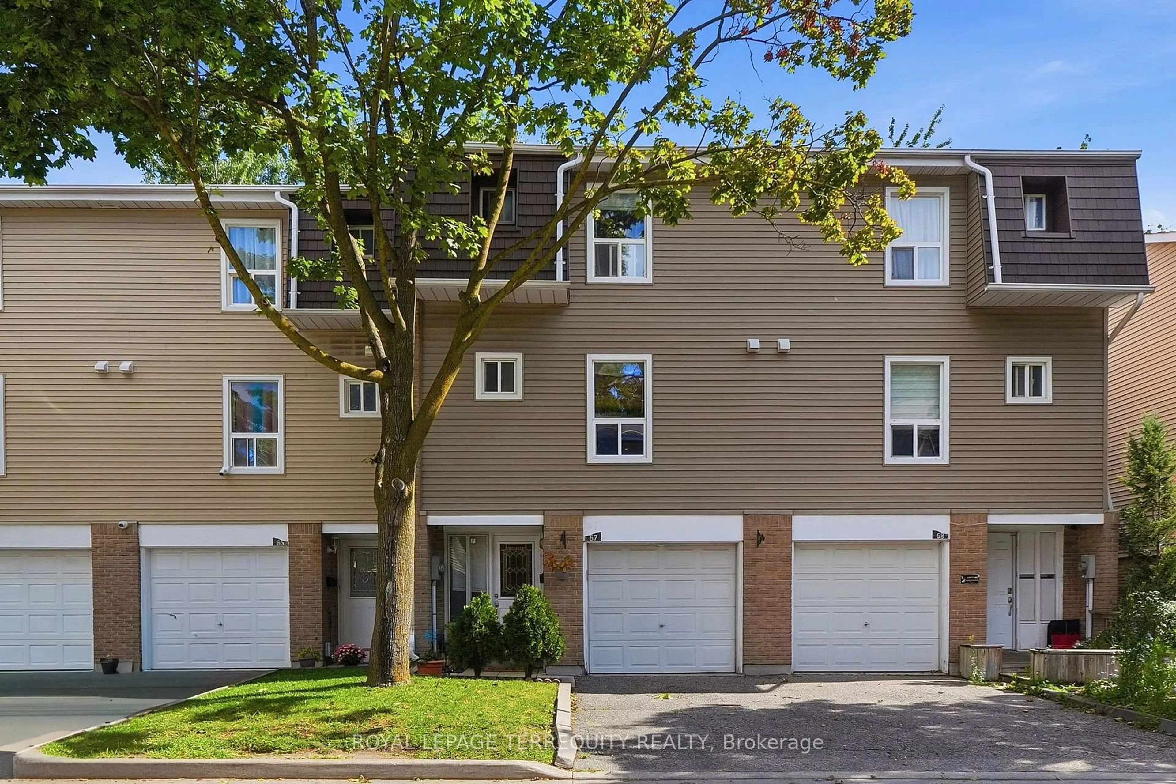 A pic from outside/outdoor area/front of a property/back of a property/a pic from drone, street for 67 Enmount Dr, Brampton Ontario L6T 4C9
