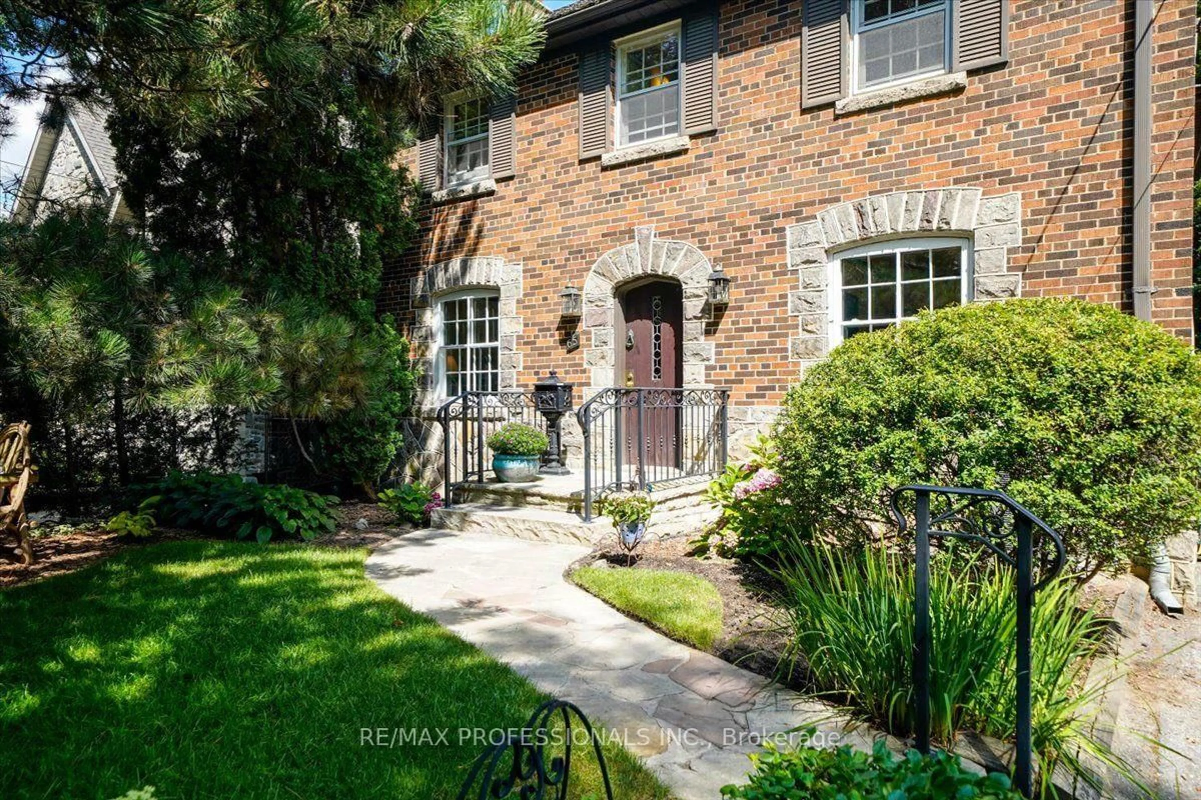 Home with brick exterior material, street for 65 Dunedin Dr, Toronto Ontario M8X 2K7