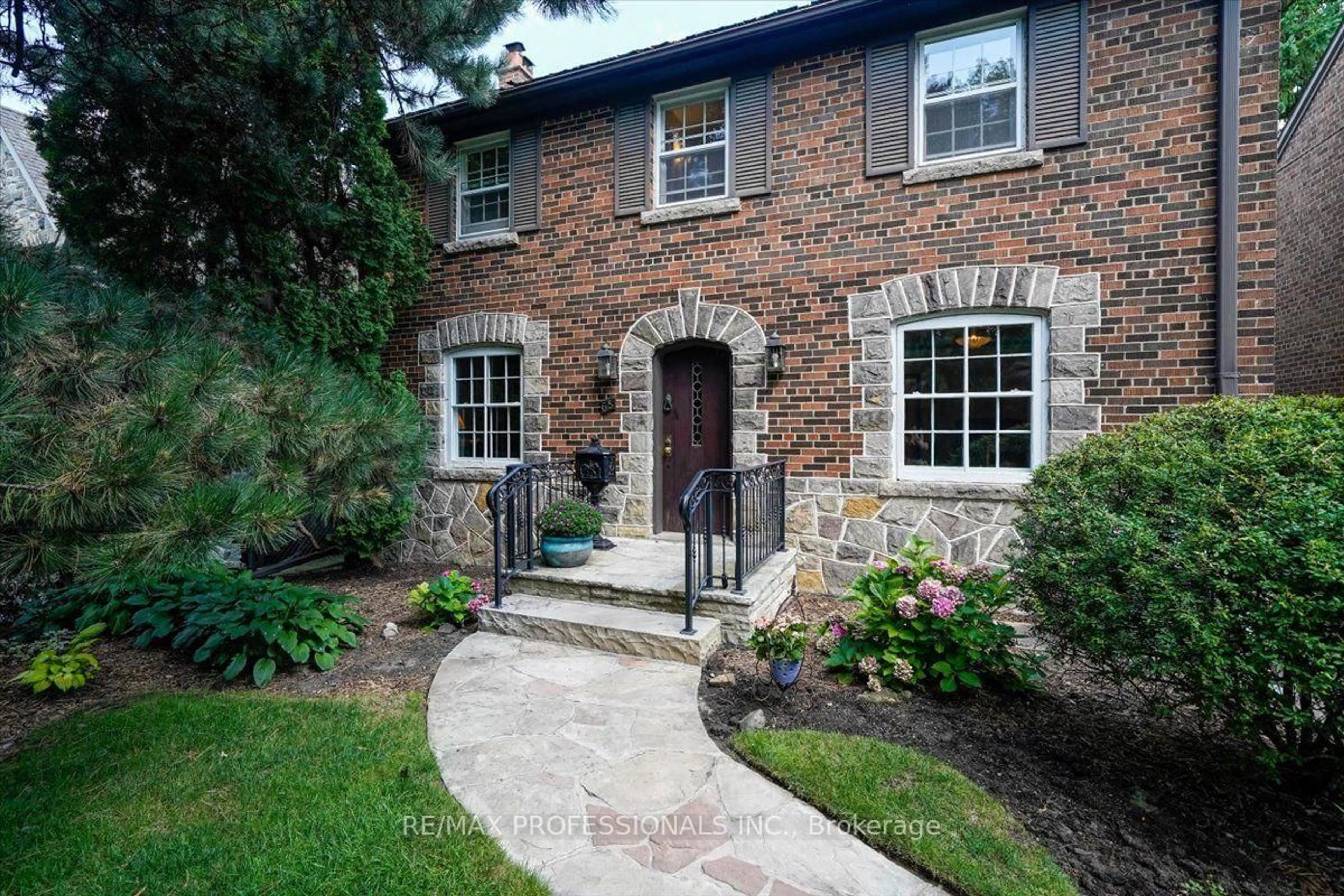 Home with brick exterior material, street for 65 Dunedin Dr, Toronto Ontario M8X 2K7