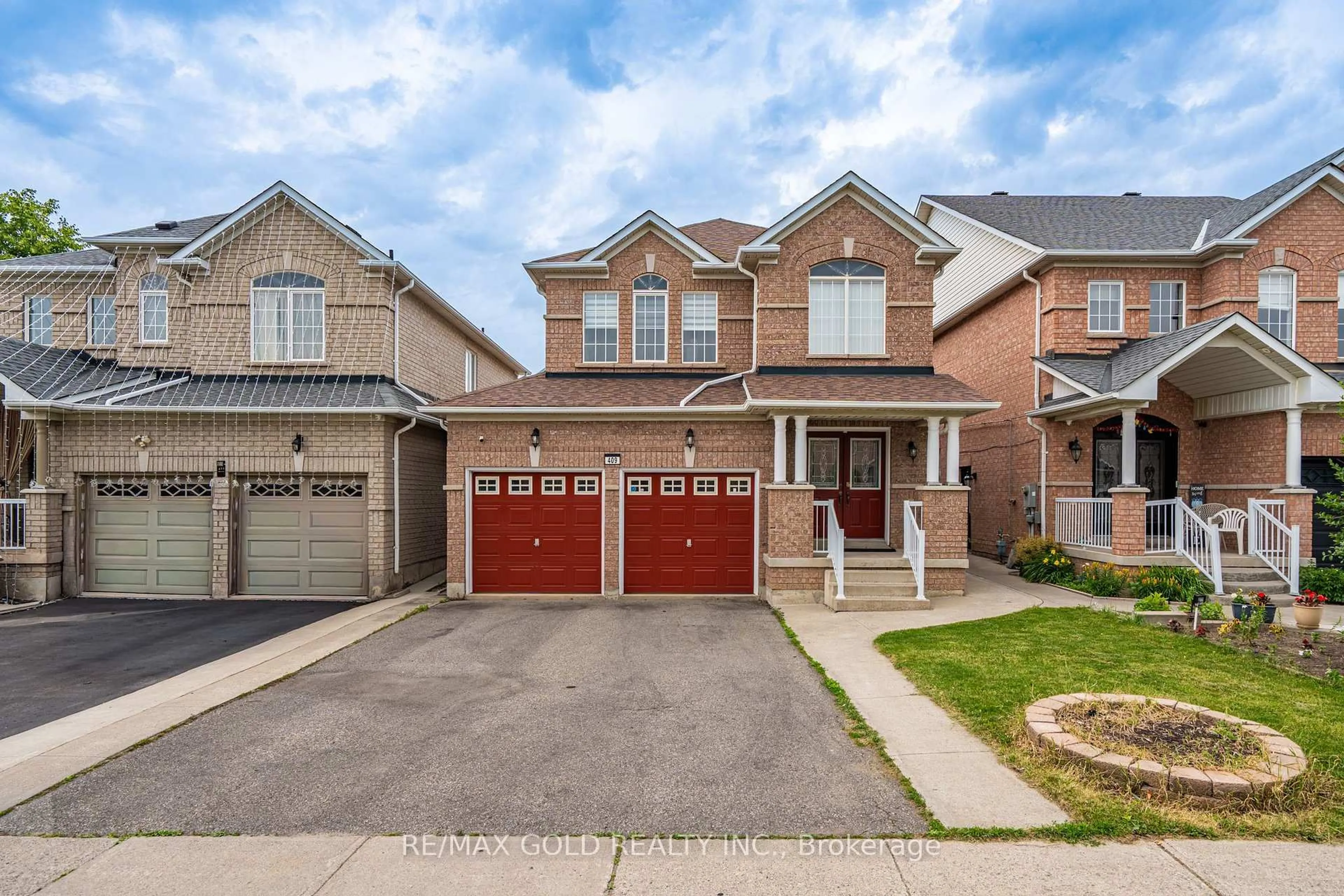 Home with brick exterior material, street for 409 Fernforest Dr, Brampton Ontario L6R 3B6