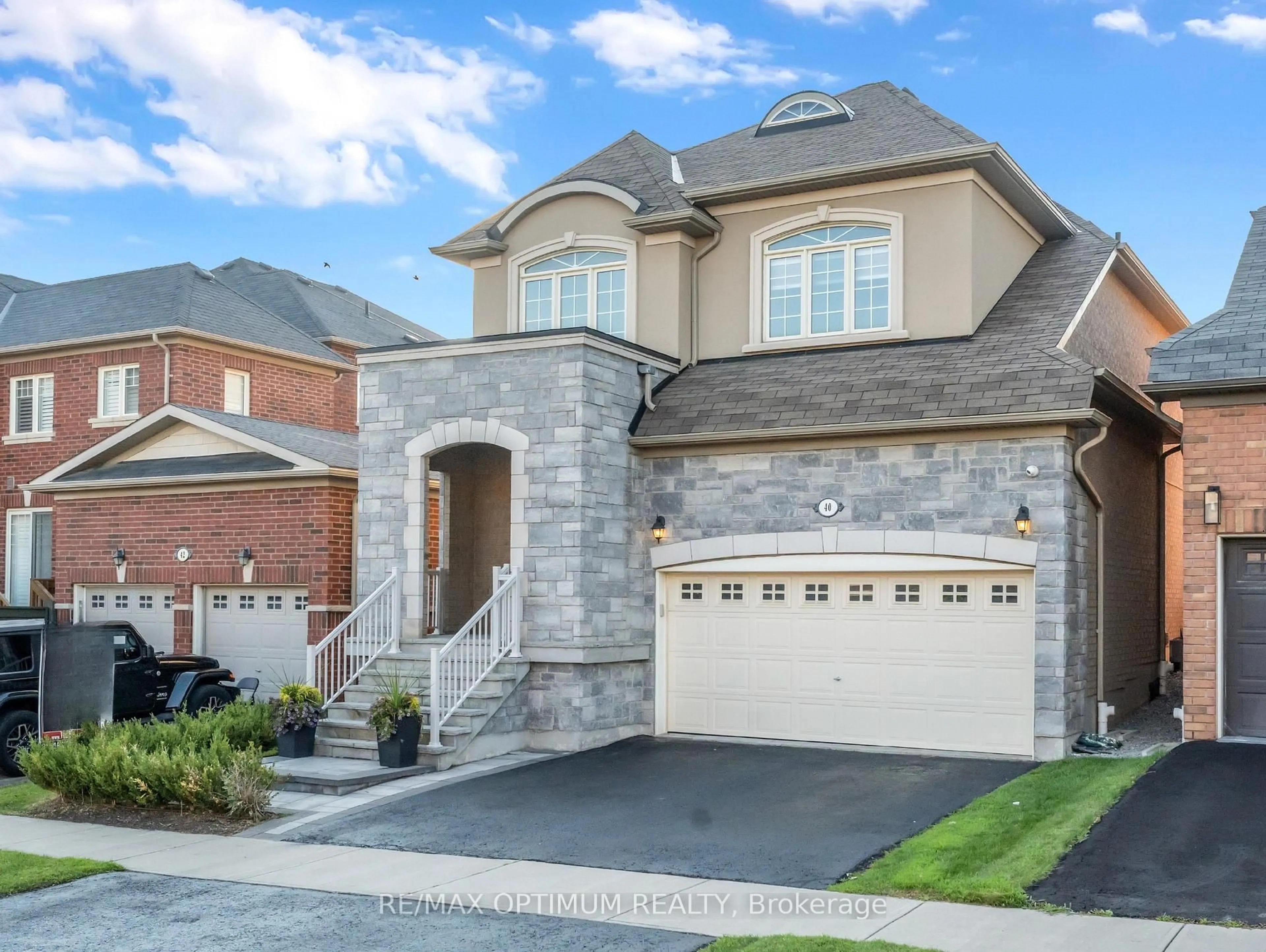Home with brick exterior material, street for 40 Attraction Dr, Brampton Ontario L6Y 0C1