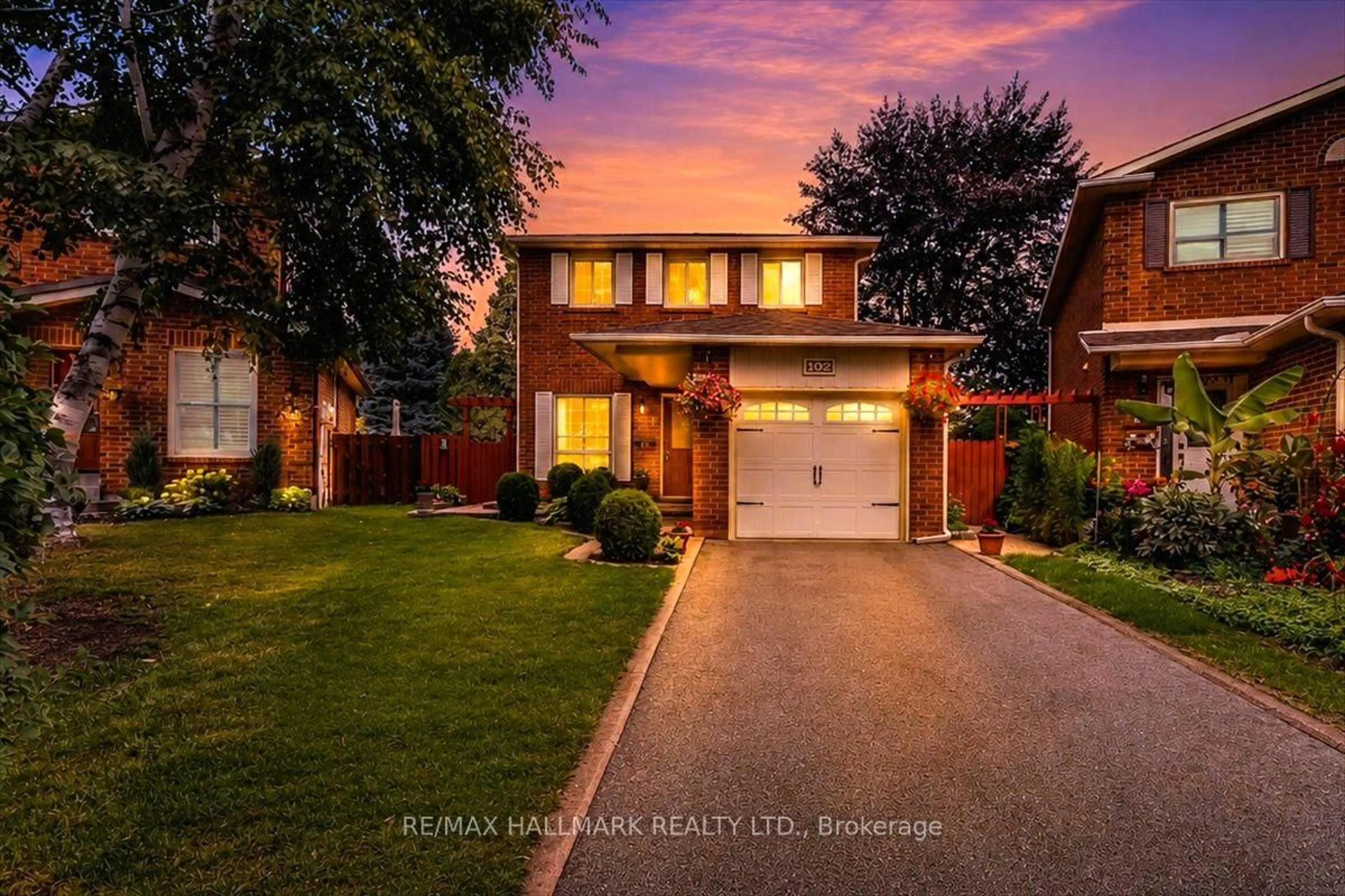 Home with brick exterior material, street for 102 Trewartha Cres, Brampton Ontario L6Z 1X4