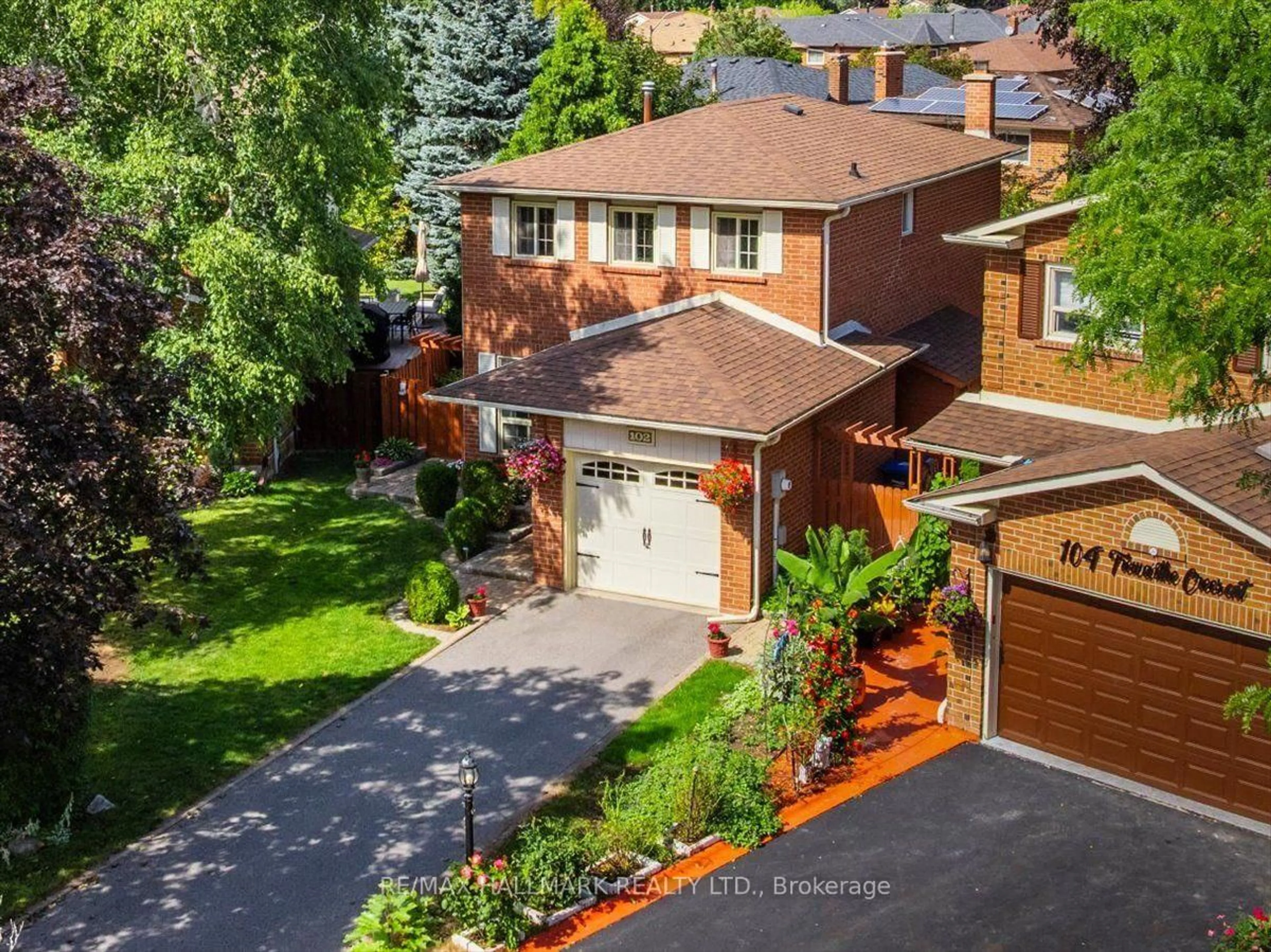 A pic from outside/outdoor area/front of a property/back of a property/a pic from drone, street for 102 Trewartha Cres, Brampton Ontario L6Z 1X4