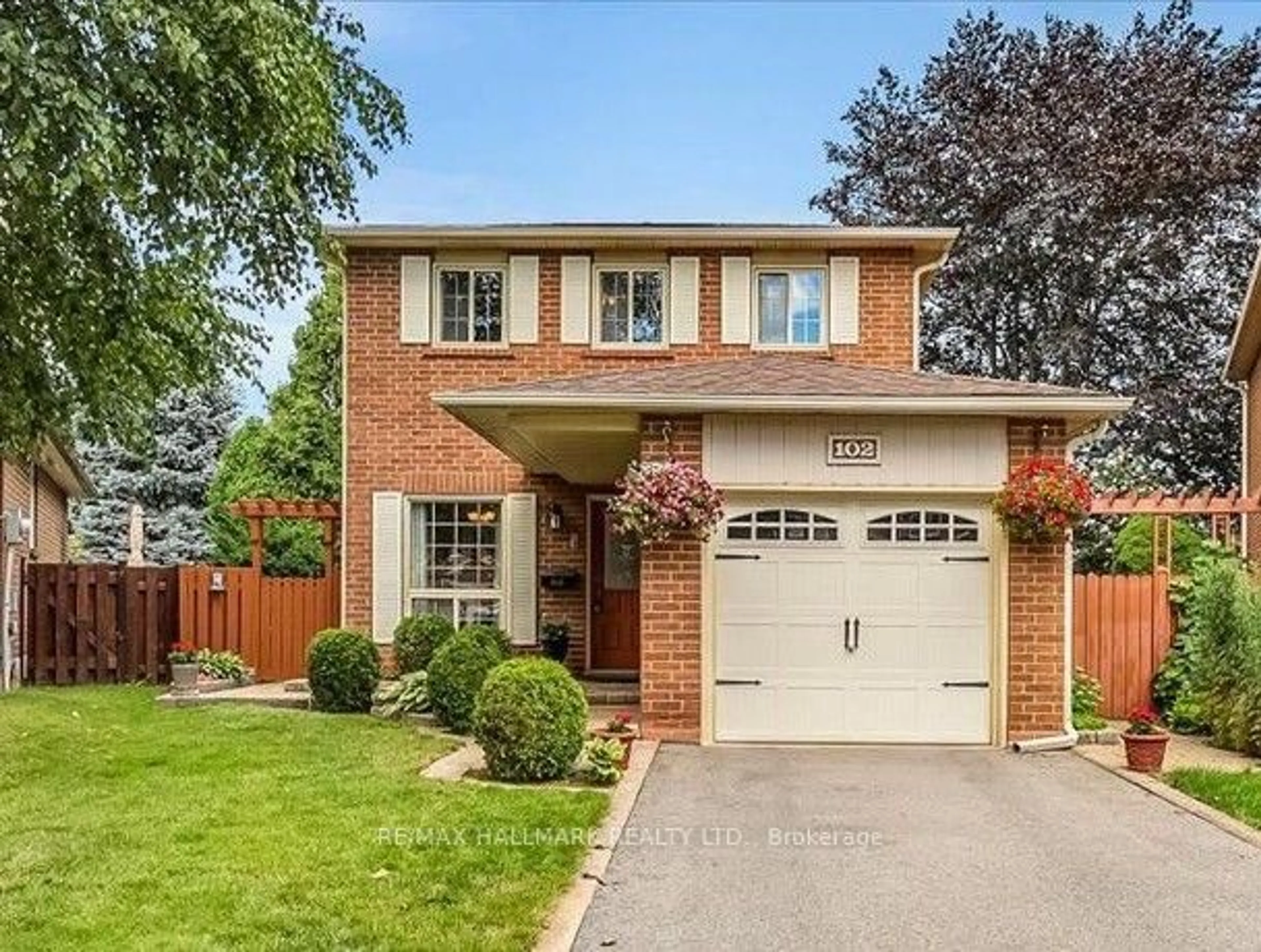 Home with brick exterior material, street for 102 Trewartha Cres, Brampton Ontario L6Z 1X4