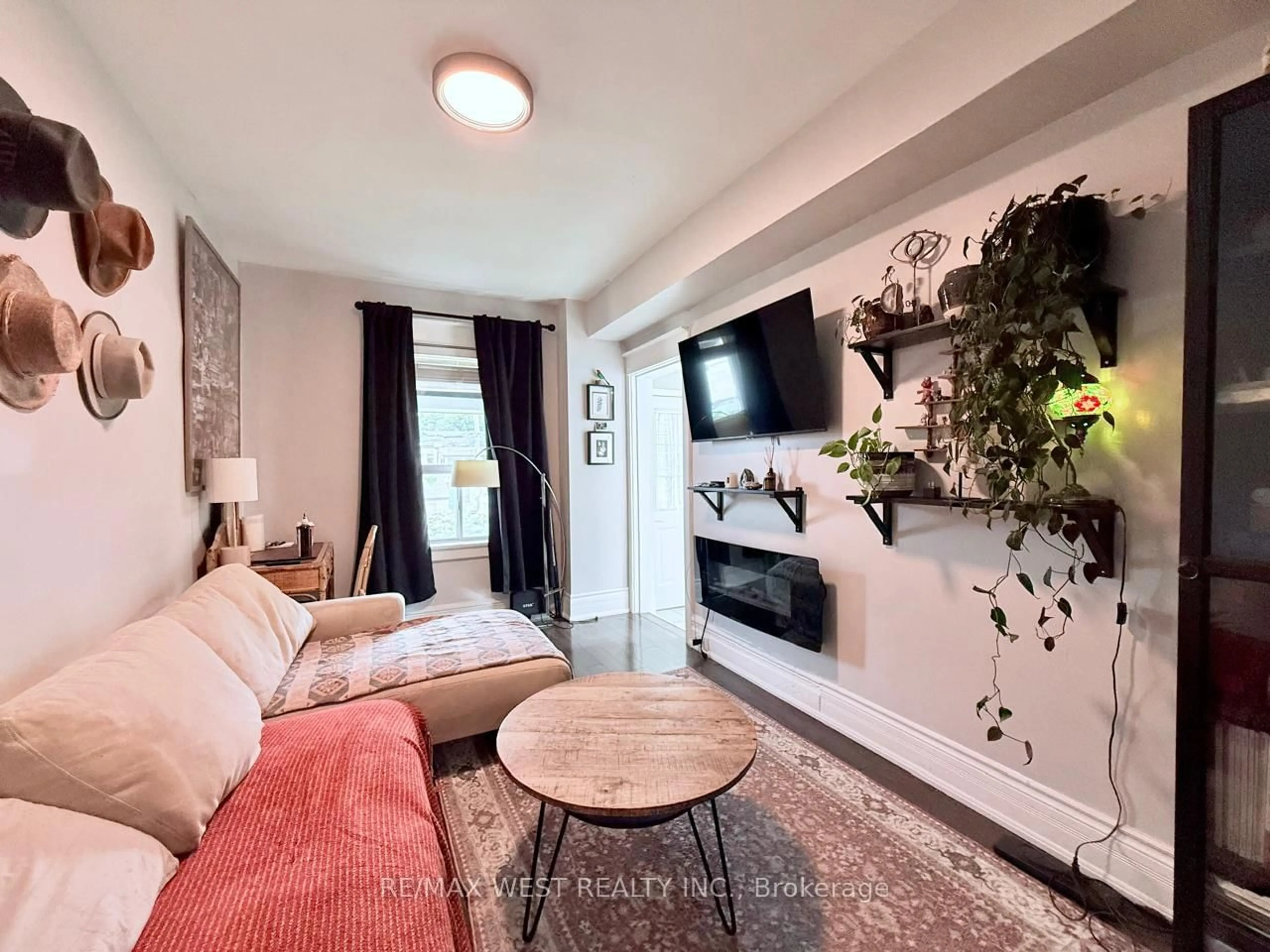 Living room with furniture, unknown for 231 Rosemount Ave, Toronto Ontario M6H 2N2
