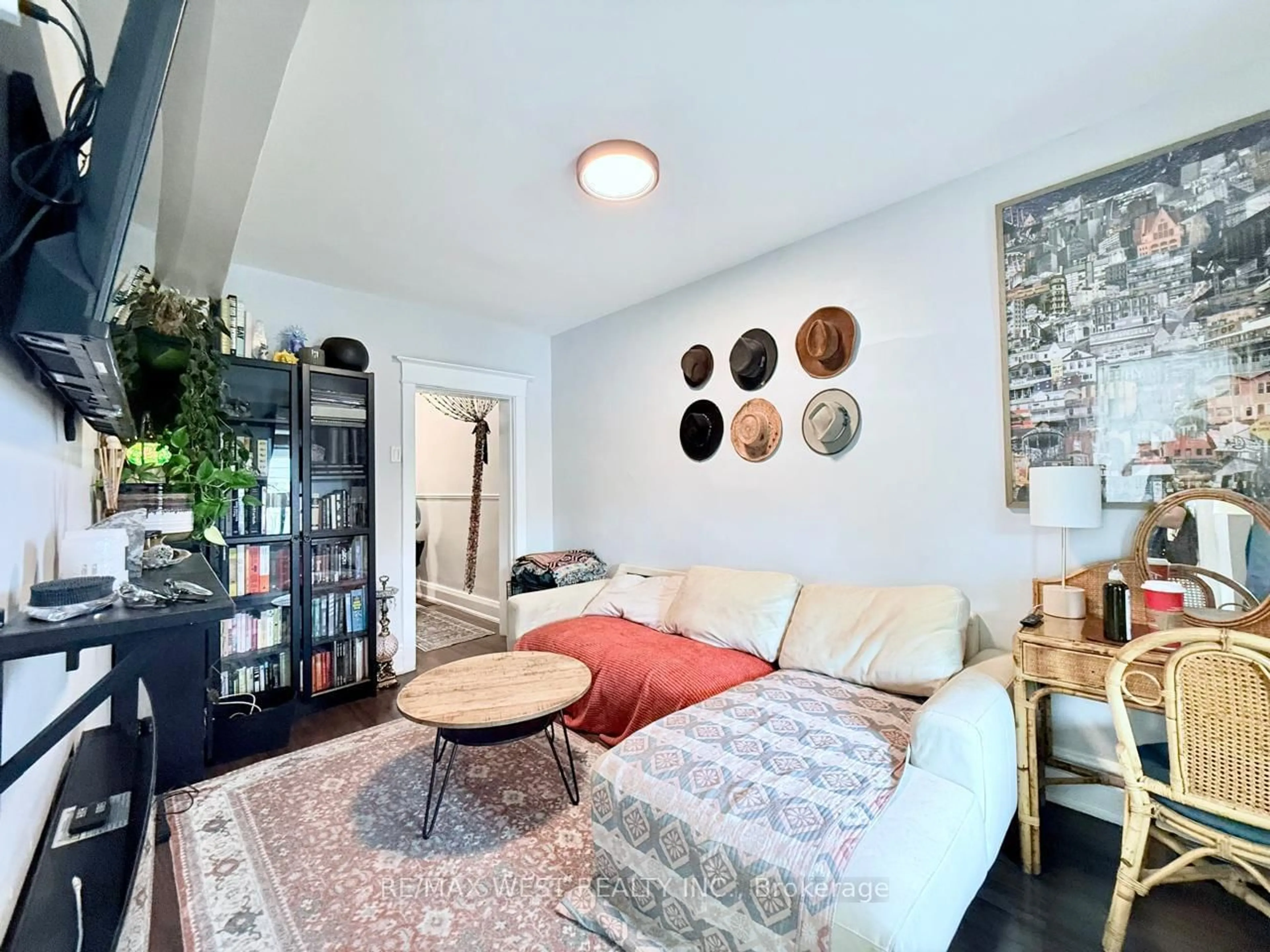 Living room with furniture, unknown for 231 Rosemount Ave, Toronto Ontario M6H 2N2