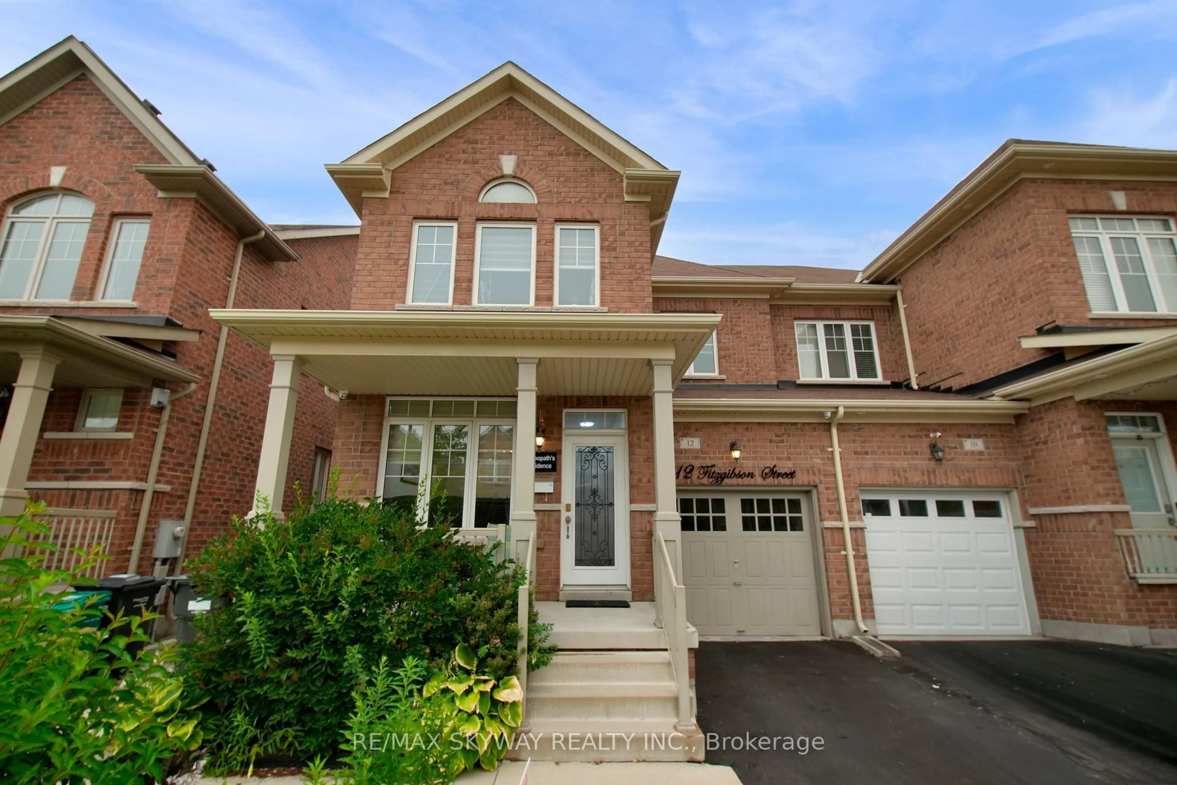 Home with brick exterior material, street for 12 Fitzgibson St, Brampton Ontario L6Y 5Y5