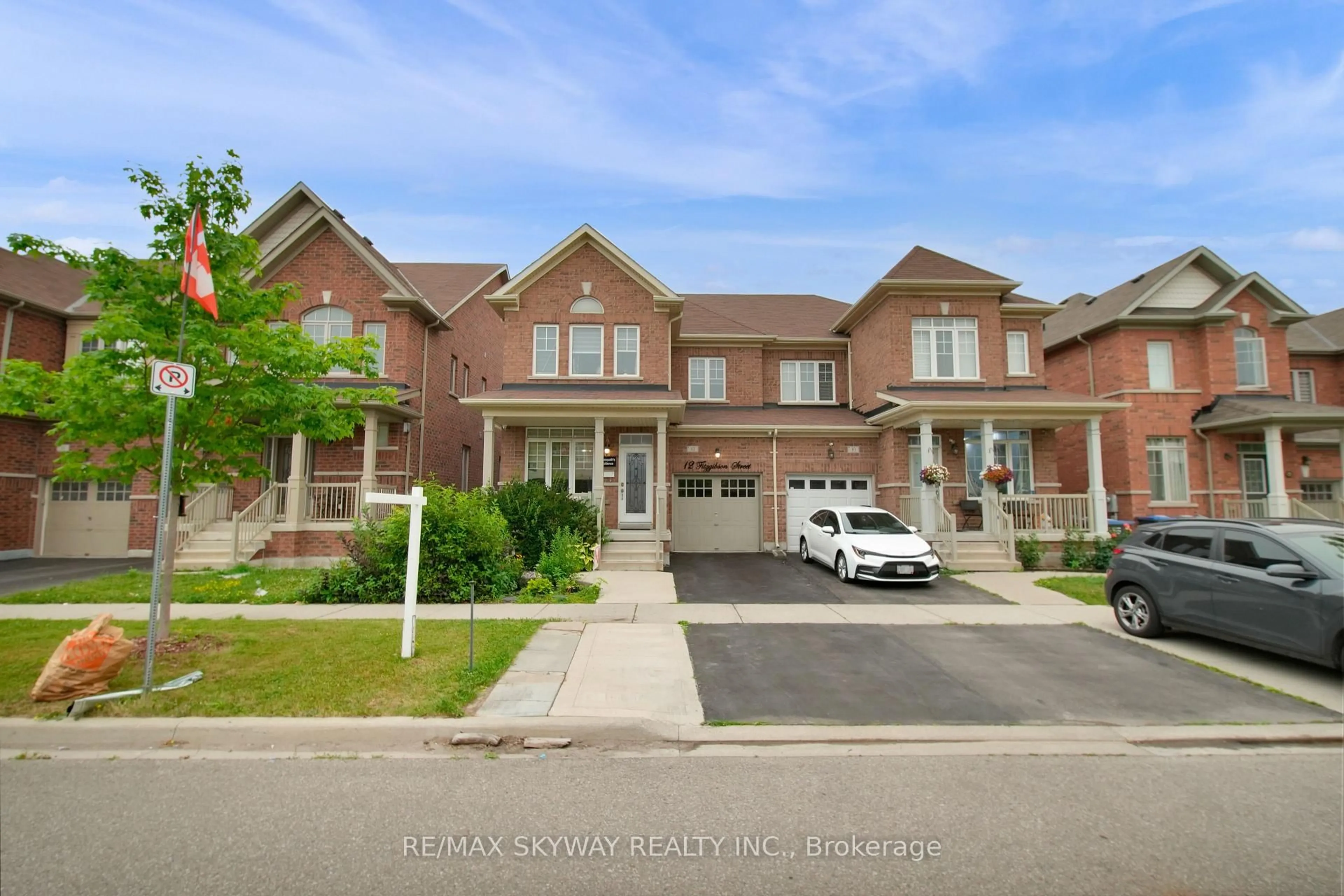 Home with brick exterior material, street for 12 Fitzgibson St, Brampton Ontario L6Y 5Y5