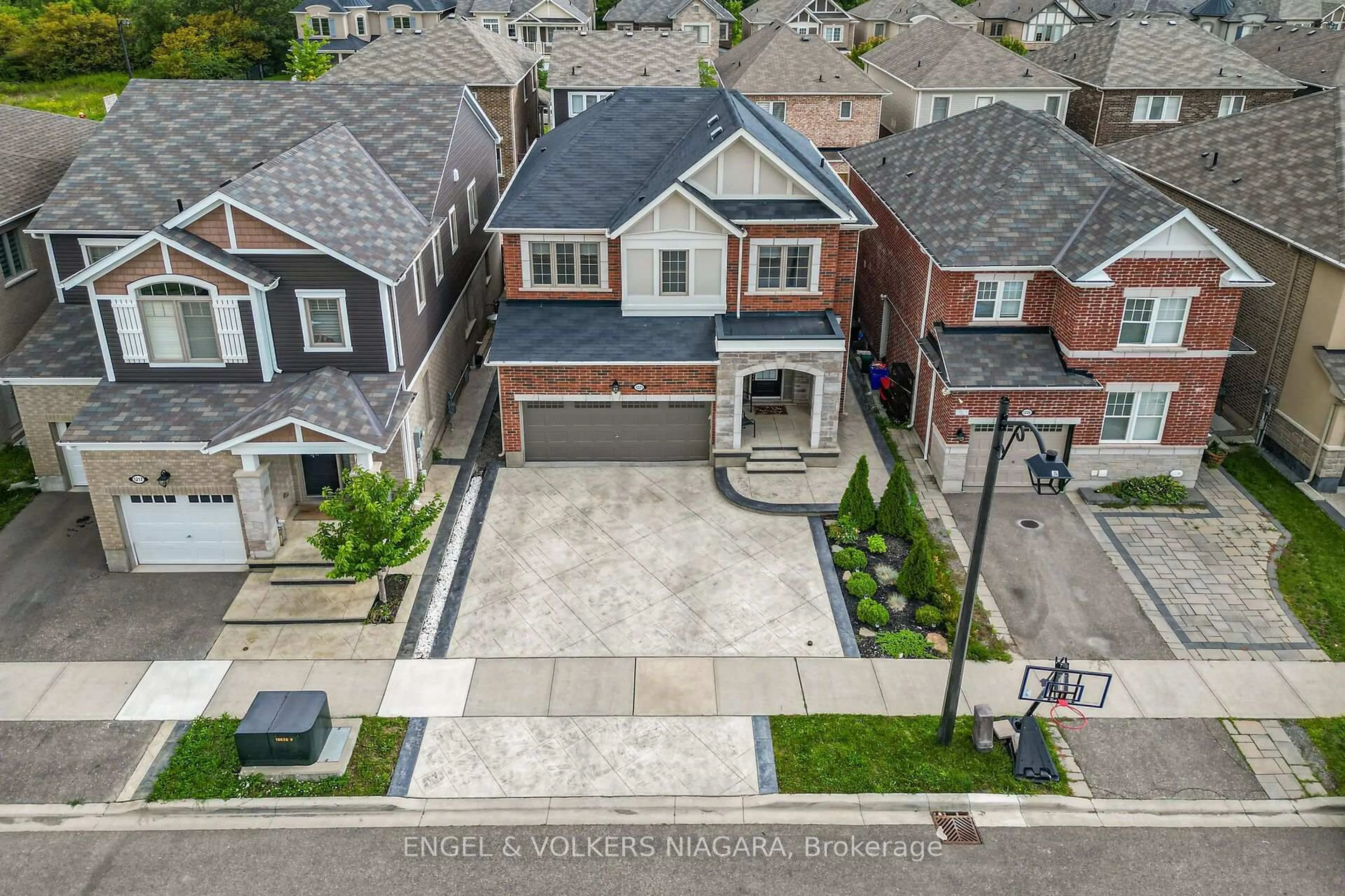 A pic from outside/outdoor area/front of a property/back of a property/a pic from drone, street for 1221 Rose Way, Milton Ontario L9E 1L9