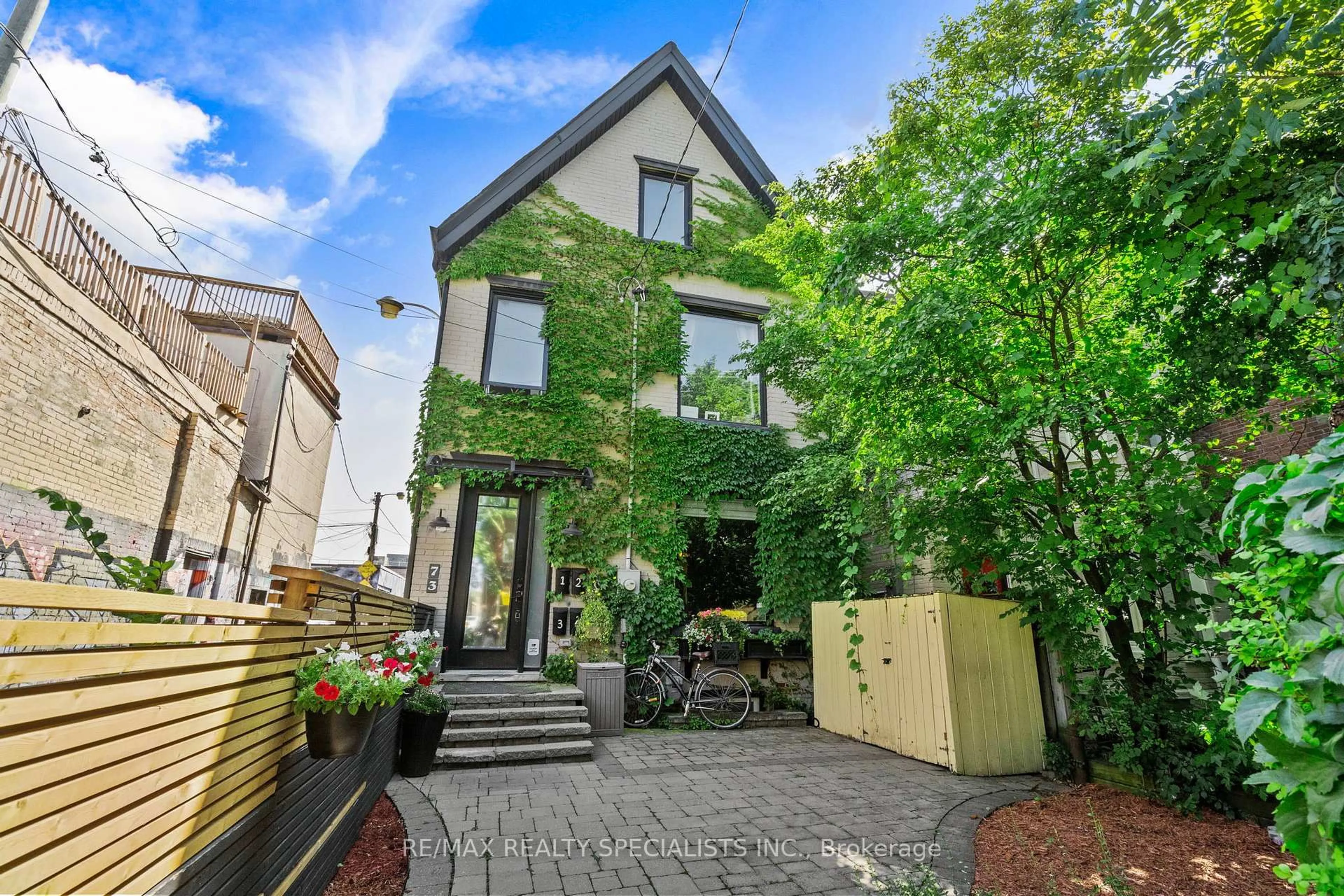 Home with brick exterior material, street for 73 Elm Grove Ave, Toronto Ontario M6K 2J2