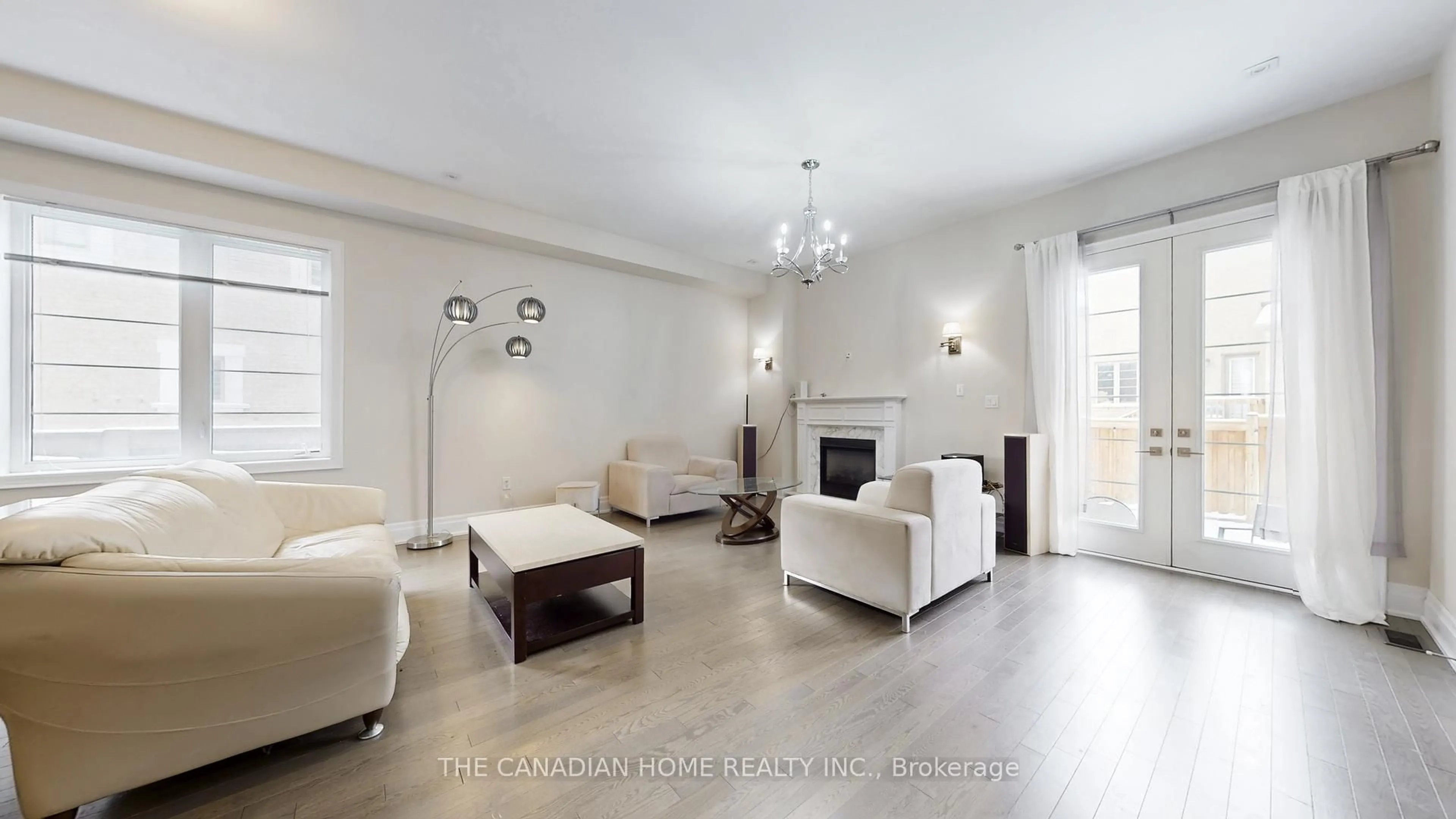 Living room with furniture, ceramic/tile floor for 20 Settlers Field Rd, Brampton Ontario L6X 5P2