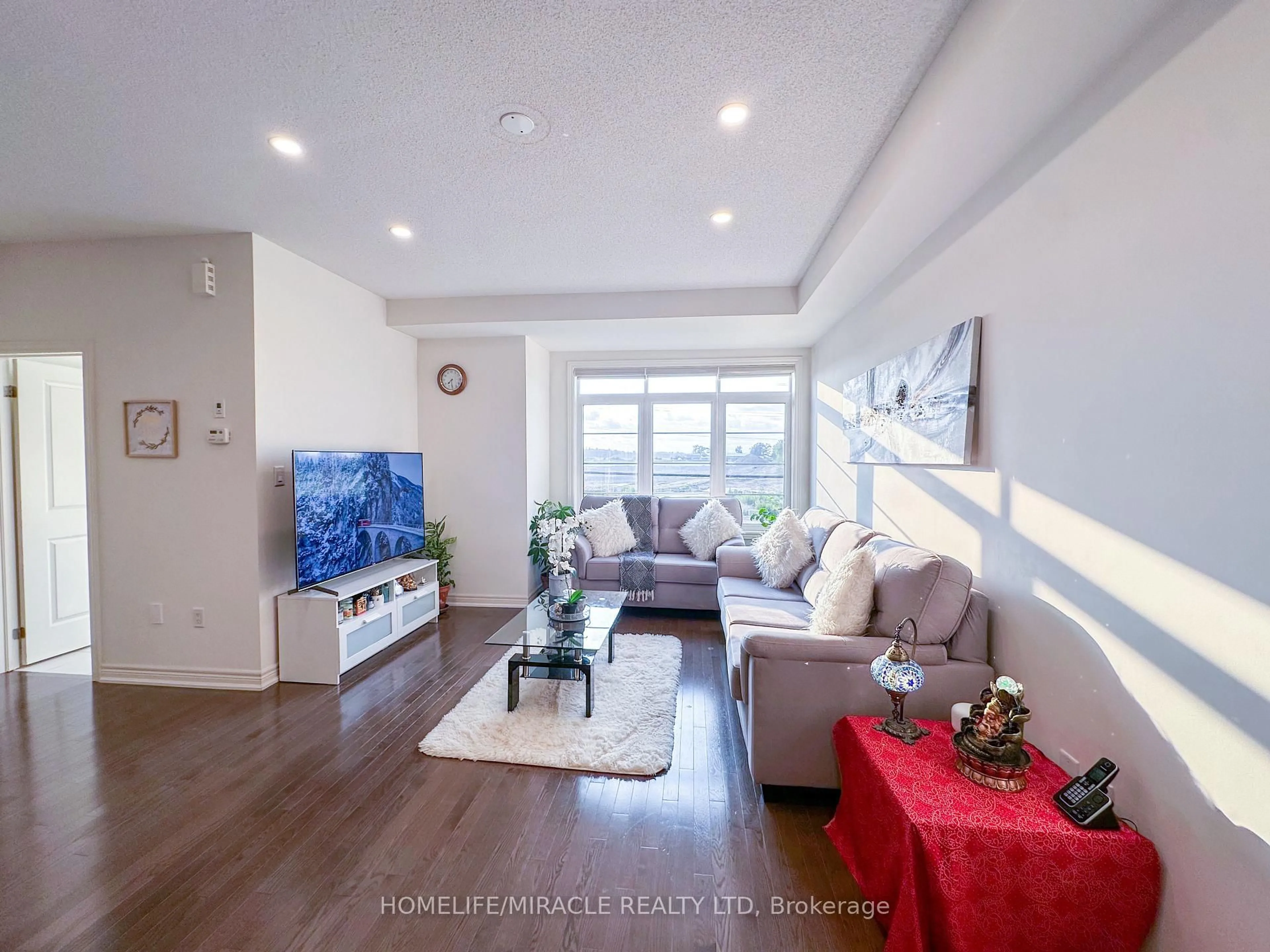 Living room with furniture, unknown for 58 Fruitvale Circ, Brampton Ontario L7A 5B8