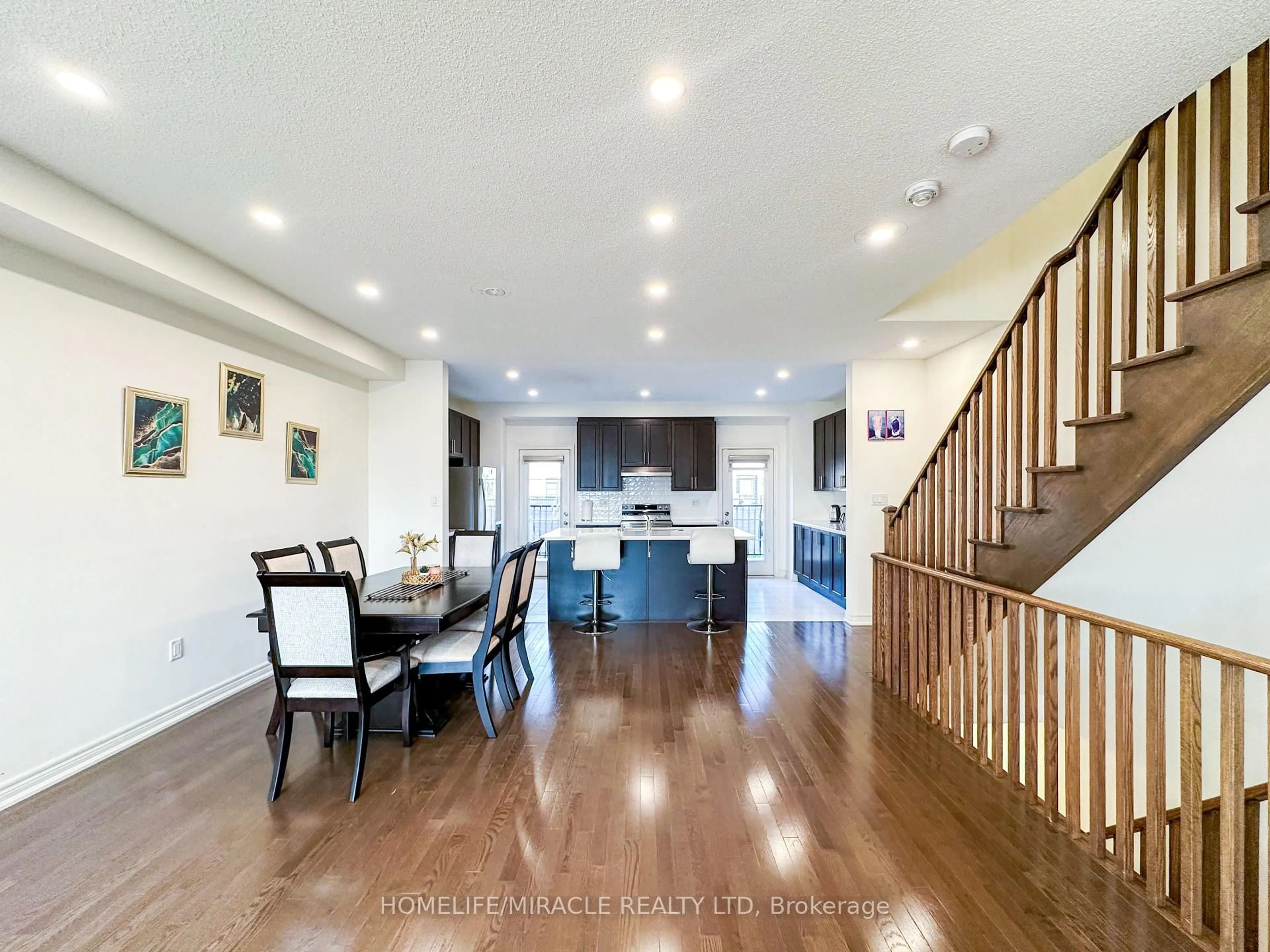 Open concept kitchen, wood/laminate floor for 58 Fruitvale Circ, Brampton Ontario L7A 5B8